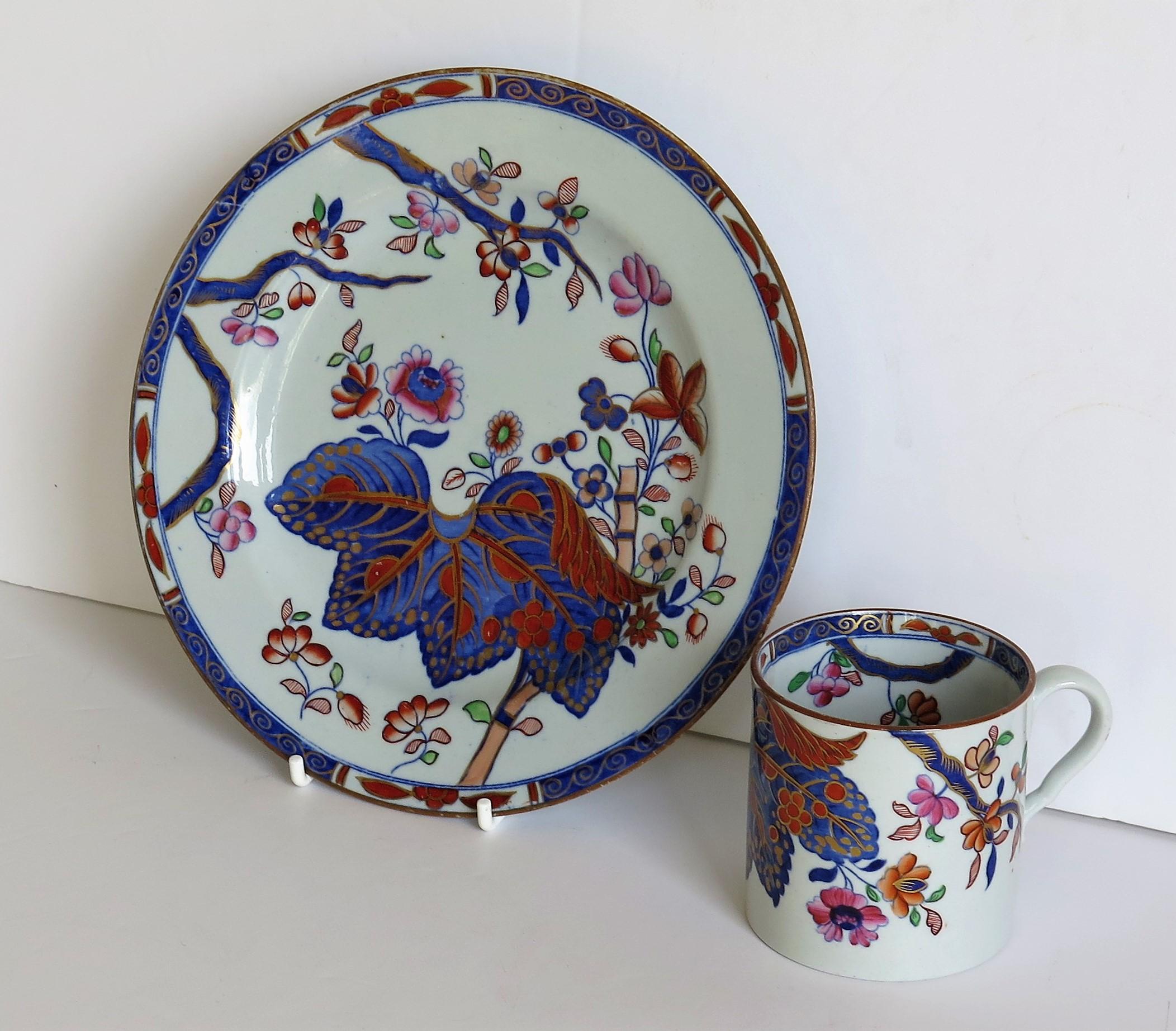 This is a very good stone China (Ironstone) coffee can and side plate, both hand painted in the tobacco leaf pattern, number 2061, made by the Spode factory in the early 19th century, English Georgian period, circa 1820.

Both pieces are made from