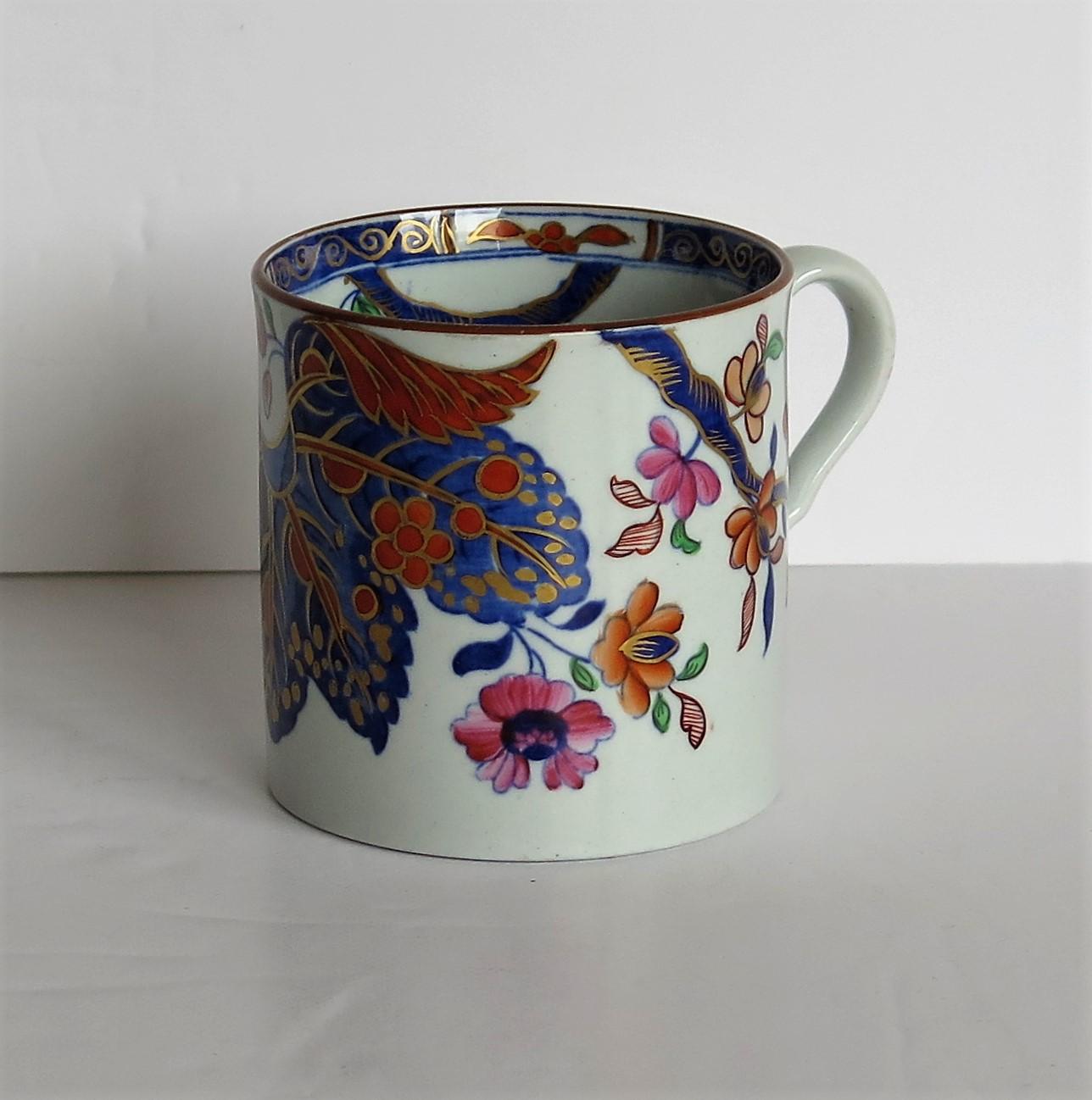 This is a very good stone China (Ironstone) coffee can hand painted in the tobacco leaf pattern, number 2061, made by the Spode factory in the early 19th century, English Georgian period, circa 1820.

This coffee can or cup made from Ironstone