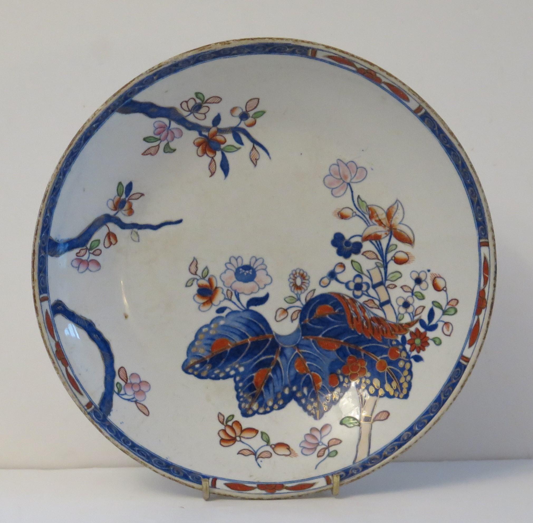 This is a very good stone China (Ironstone) large Saucer Dish or Deep Plate, hand painted in the tobacco leaf pattern, number 2061, made by the Spode factory in the early 19th century, English Georgian period, circa 1820.

The dish or plate is made