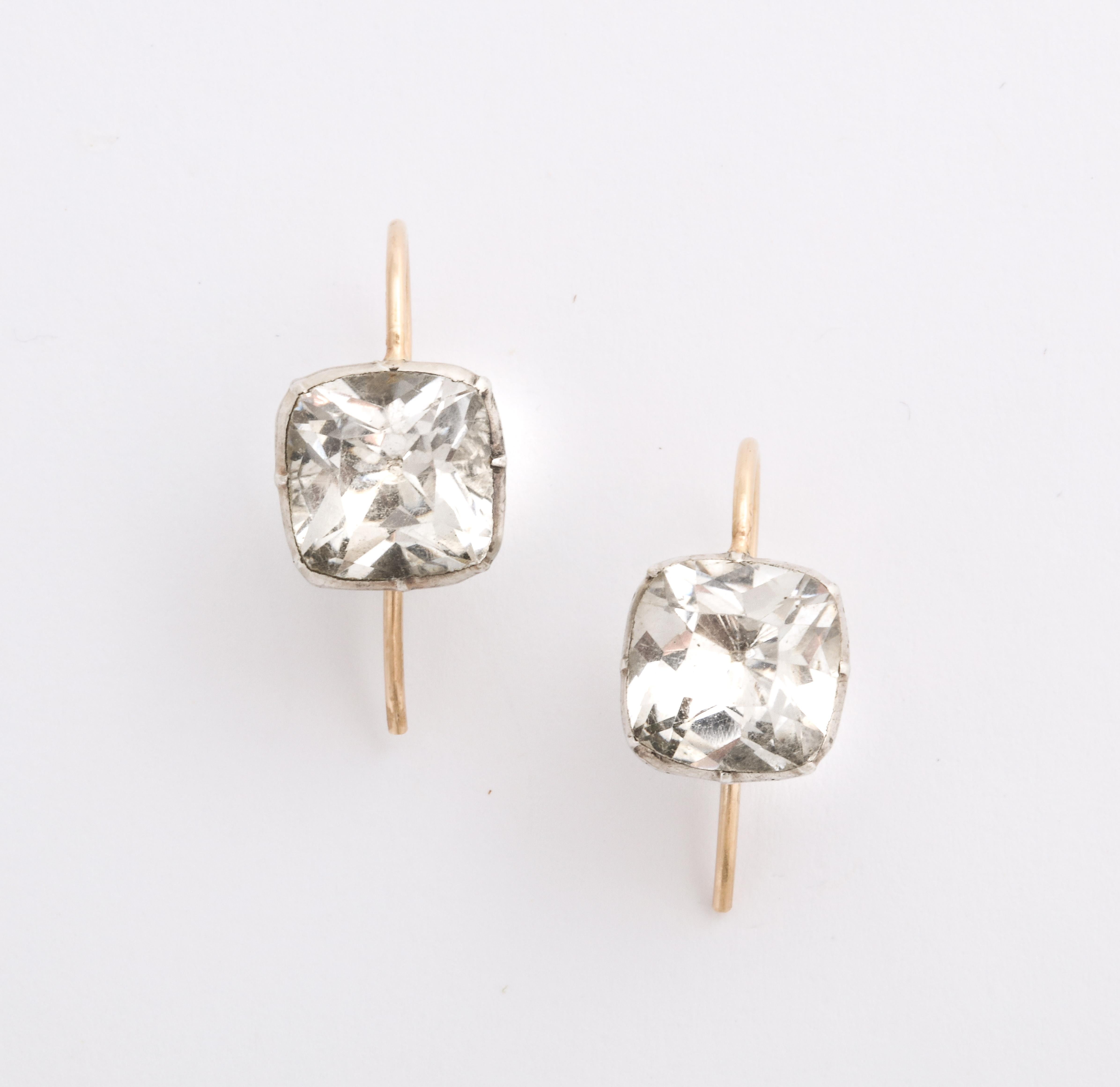 When a touch of glimmer and shimmer is enough to make you smile, this pair Georgian foiled paste earrings of approximately 1.50 Cts each fills the promise. They are in a rare and highly desirable shape and one of our favorite go to earrings for