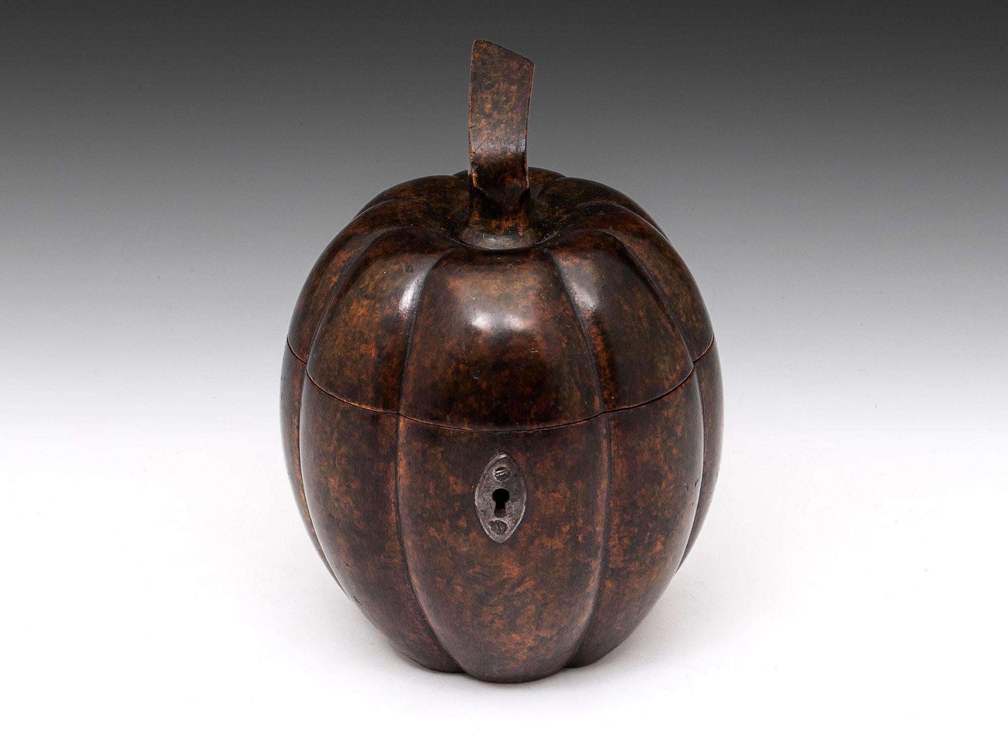 Extremely rare pumpkin / squash tea caddy with a superb dark mottled colour, lovely patination, and a wonderful original squared stalk is only seen on this type of fruit tea caddy.

The interior of this Squash Tea Caddy contains traces of its