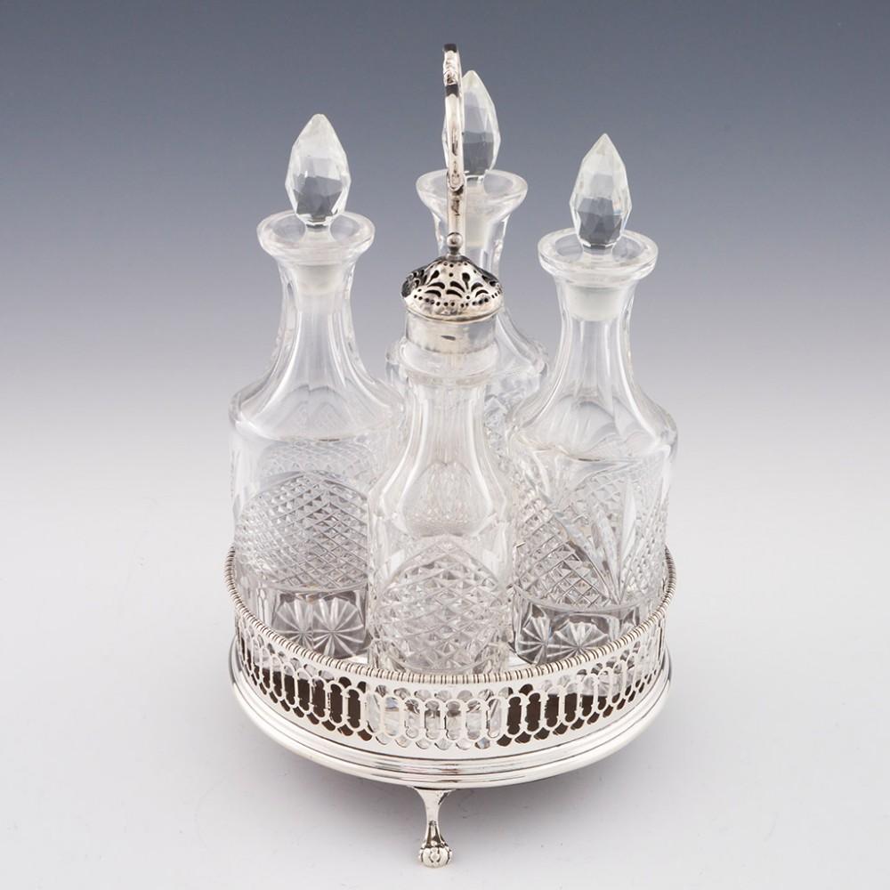 Georgian Sterling Silver Cruet, 1774

Additional information:
Date : Hallmarked in London 1774 For Robert Hennell I (see below)
Period : George III
Origin : London England
Decoration : Four cut-glass cruets, one with a pierced silver mount
Condition