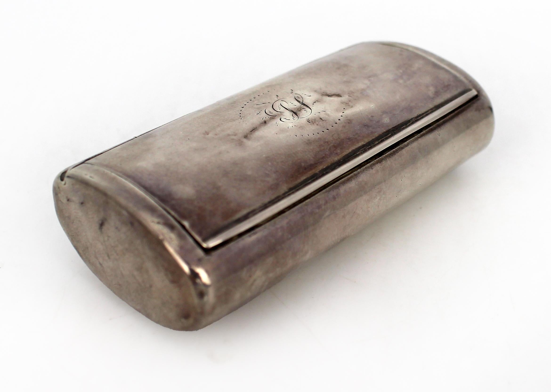 Georgian Sterling Silver Snuff Box by Joseph Ash I – London, 1802

An early 19th-century sterling silver snuff box of gently curved rectangular form, made in London in 1802 by Joseph Ash I. The hinged lid is engraved with an elegant script monogram