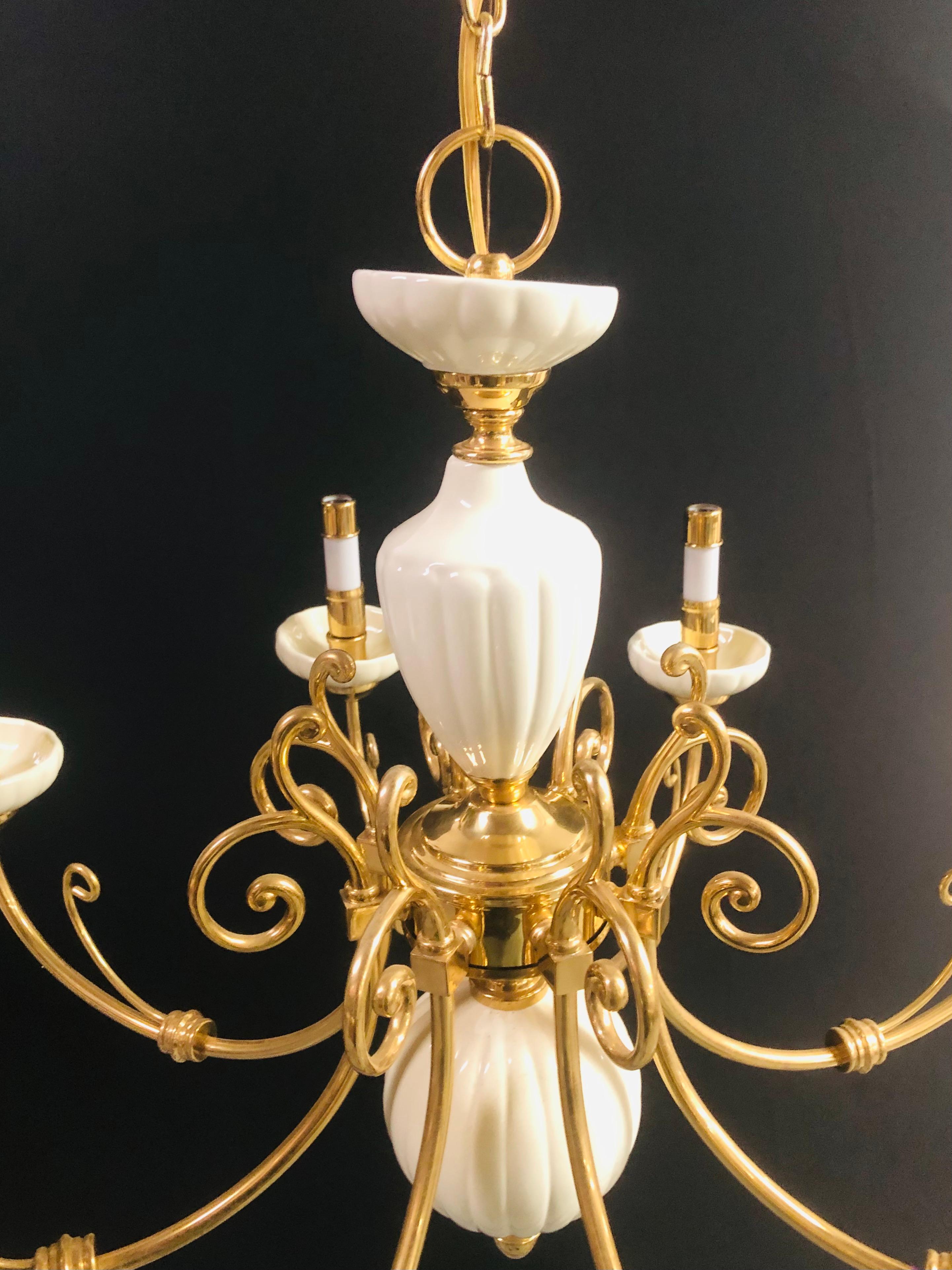 white and brass chandelier