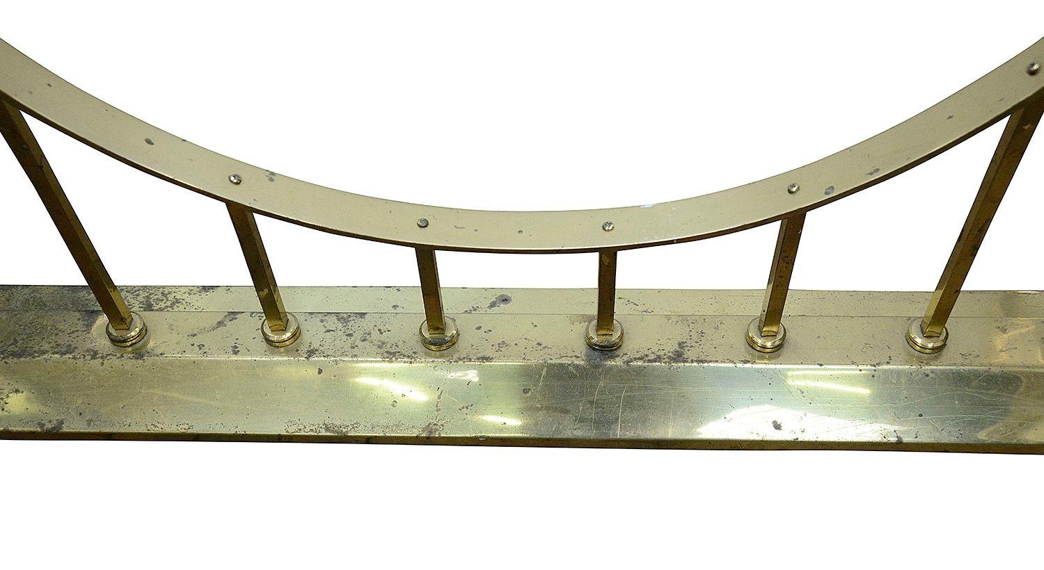 English Georgian style brass club fender. For Sale
