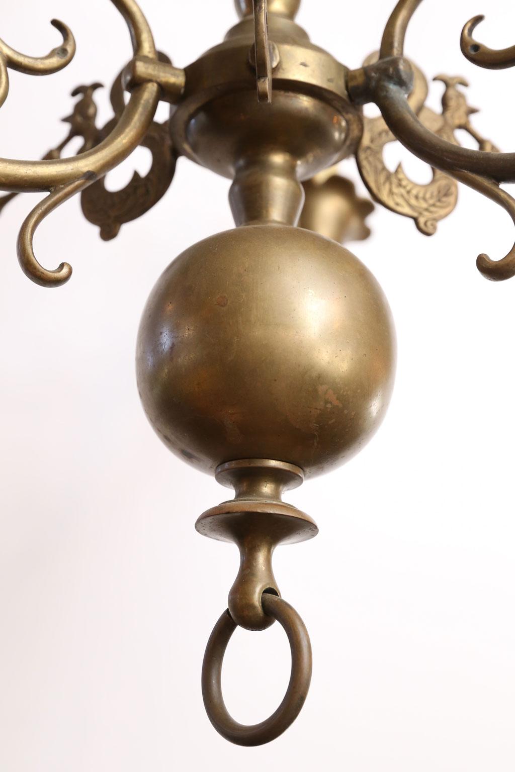 Georgian-style bronze chandelier with three upturned arms. This Belgian light from the 1930s is newly wired for use within the USA with all UL listed parts. Includes chain and a canopy (listed height does not include chain and canopy). Sometimes