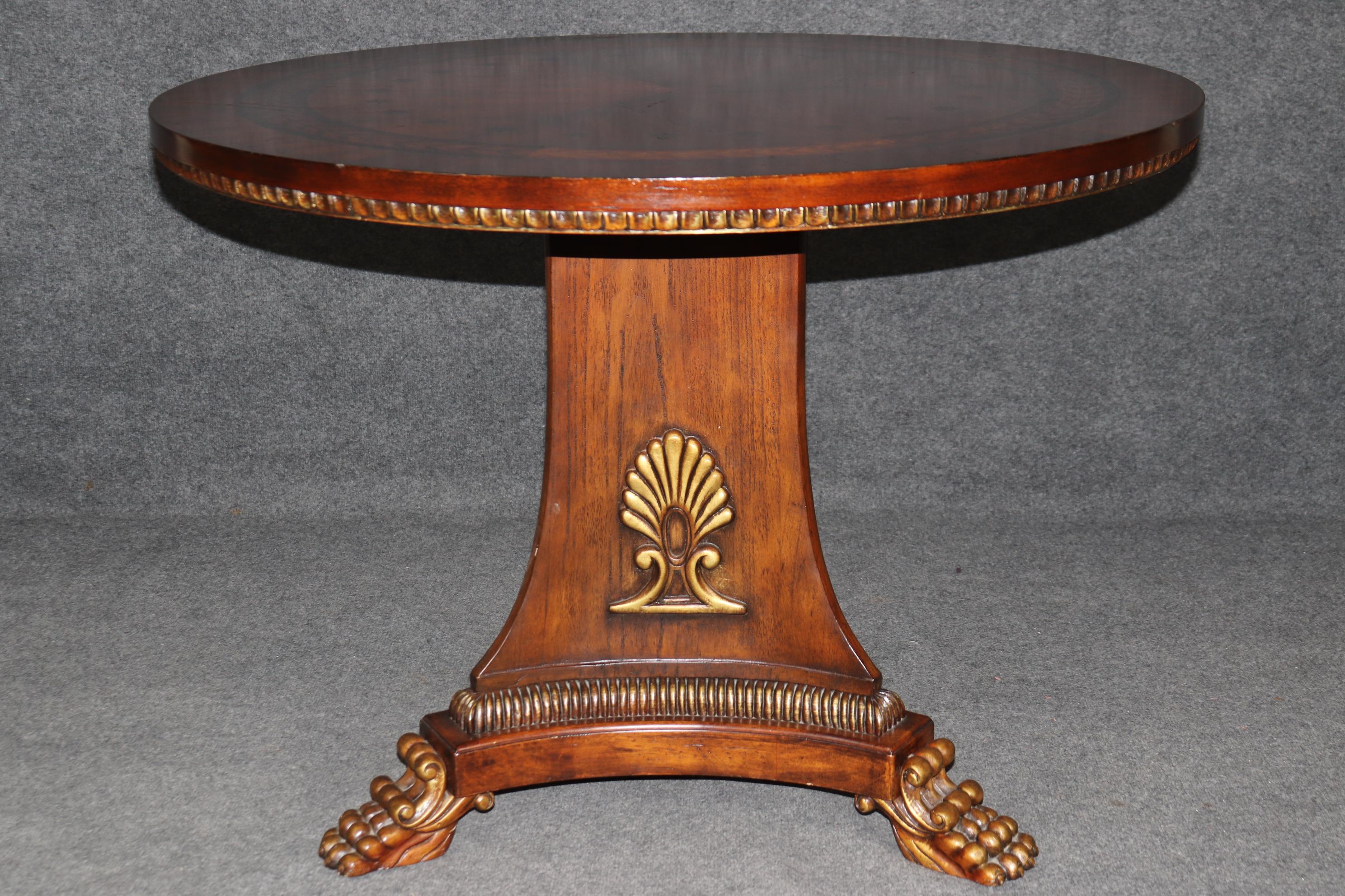 Dimensions - H: 30 in W: 40 in D: 40 in

This Georgian Style Carved Maitland Smith Quality Center Table is made of the highest quality! If you look at the photos provided you will see the attention to detail within the inlaid marquetry top as well