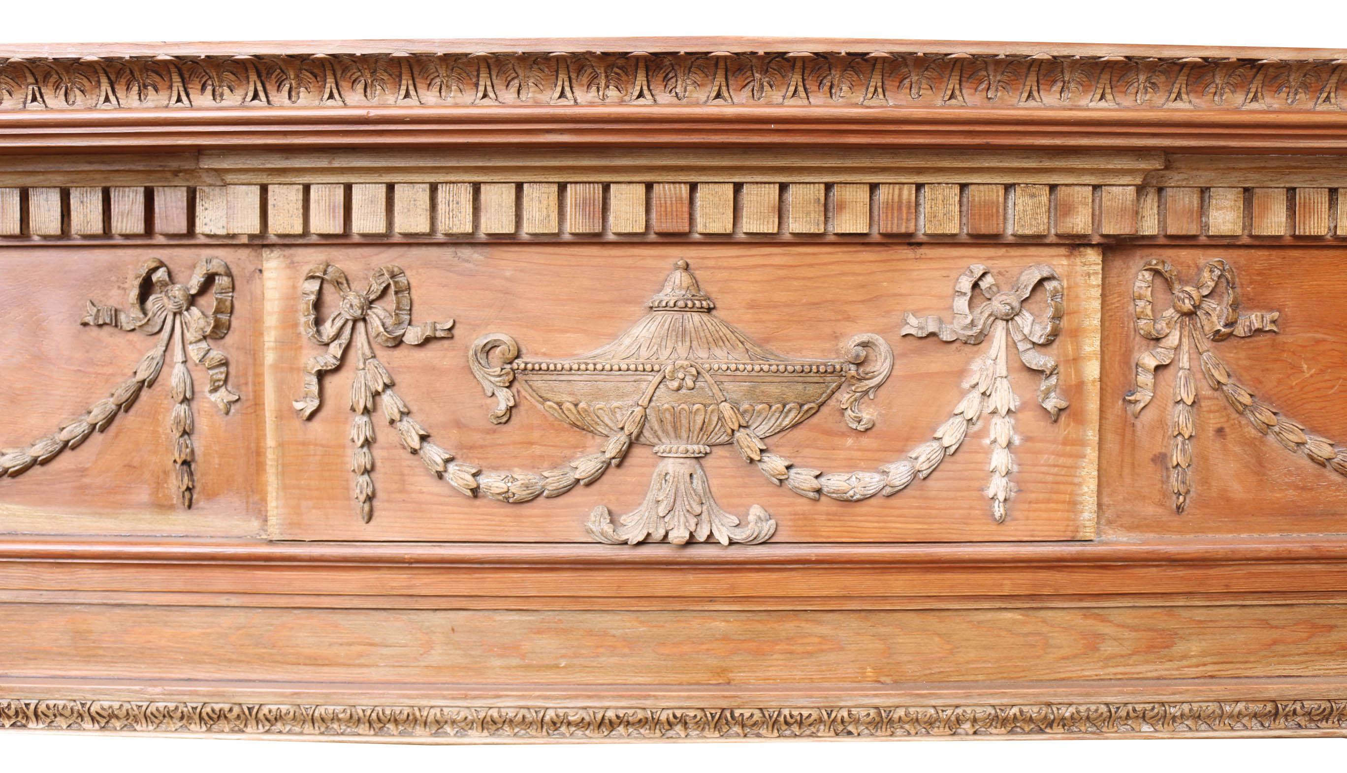 This fire surround is in very good condition. Hand-carved wooden decoration. 

Measures: Height 137 cm
Width 180 cm
Depth 22 cm
Opening height 99 cm
Opening width 118 cm
Width between legs 166 cm
Weight 23 kg.