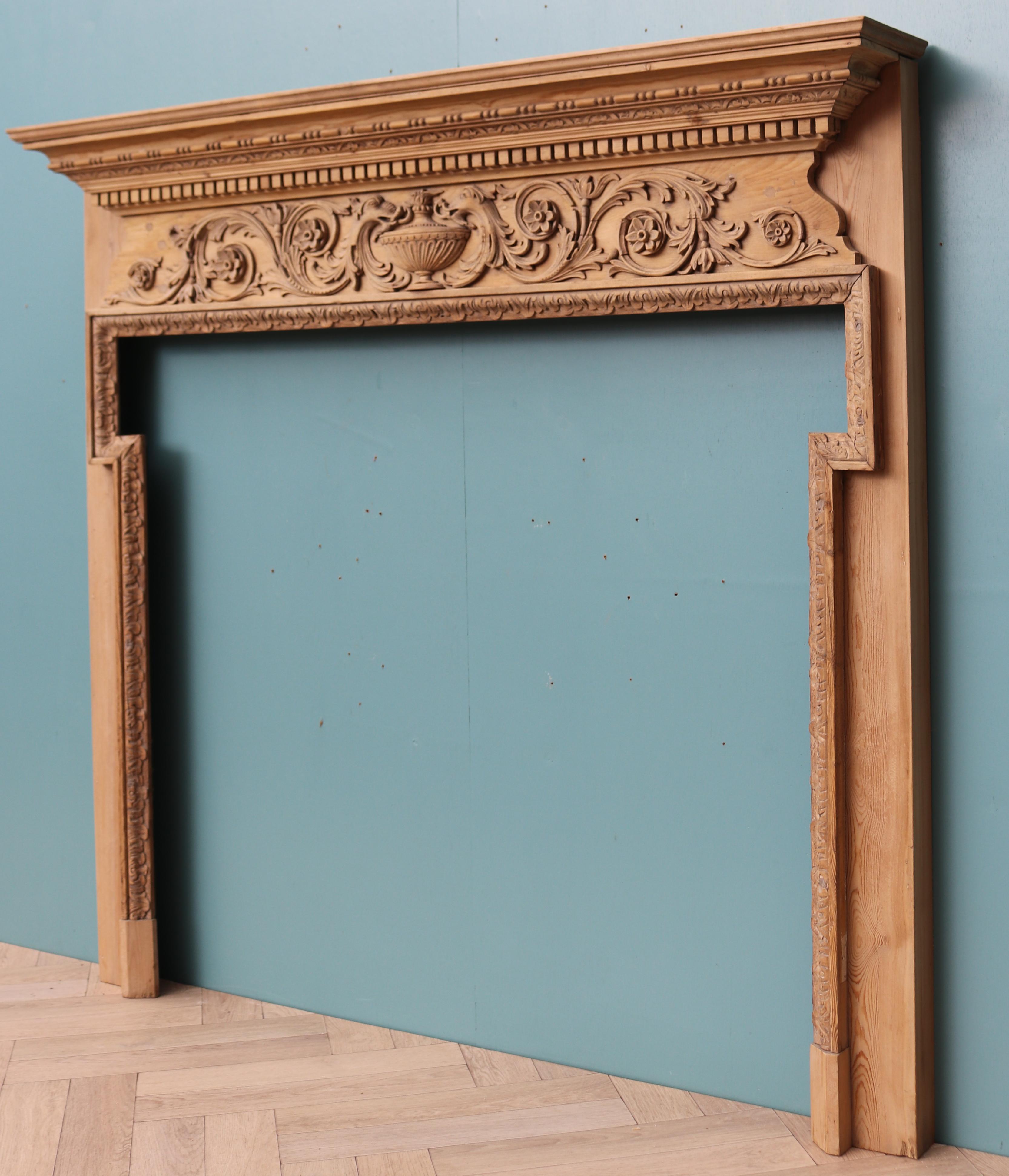 A Late Georgian style carved pine fire surround, the frieze depicting foliage and mythical creatures, centred by an urn.

Additional Dimensions:

Opening Height 104 cm

Opening Width 112-123 cm

Width between outside of the foot blocks 139