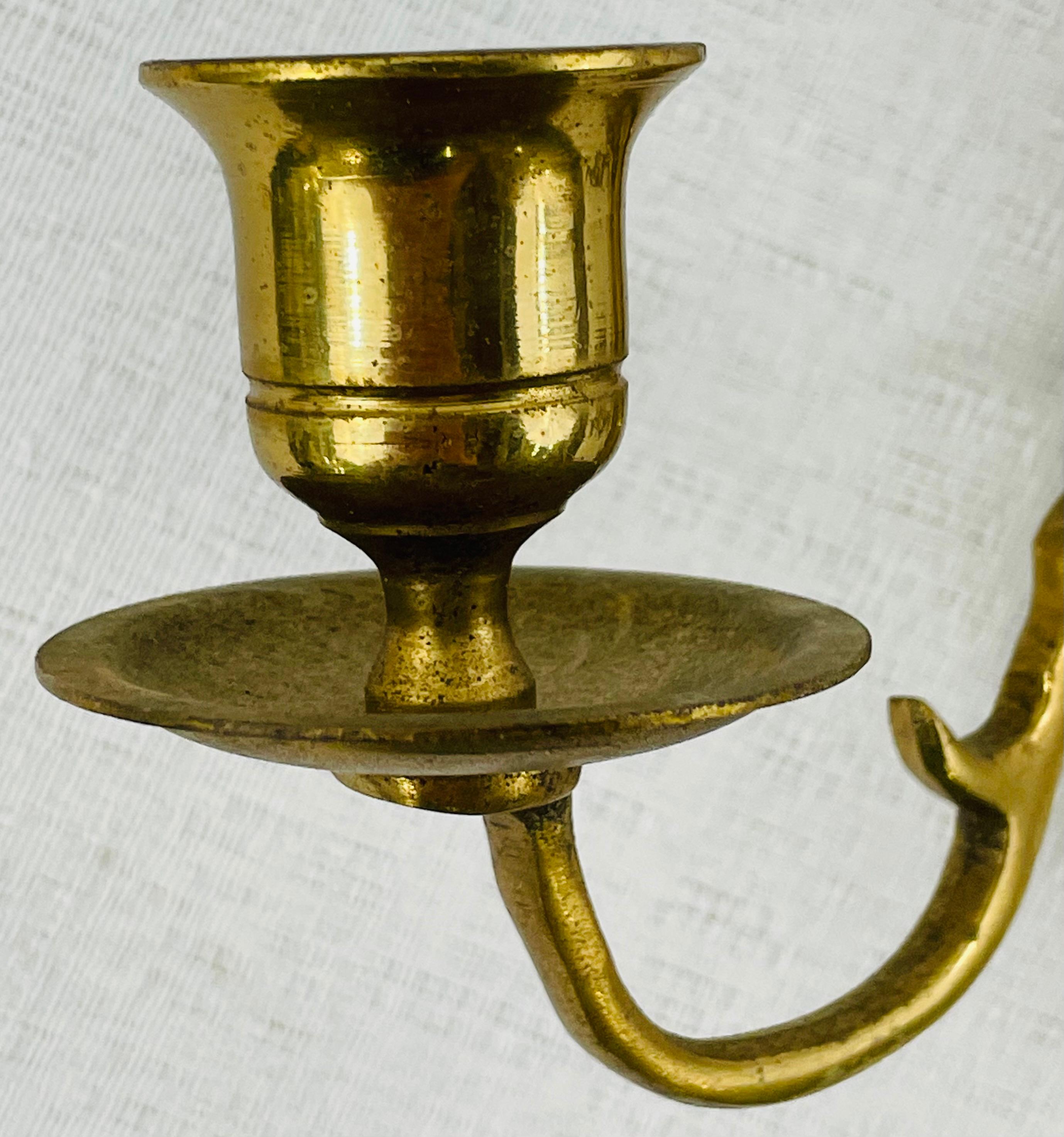brass candle sconces