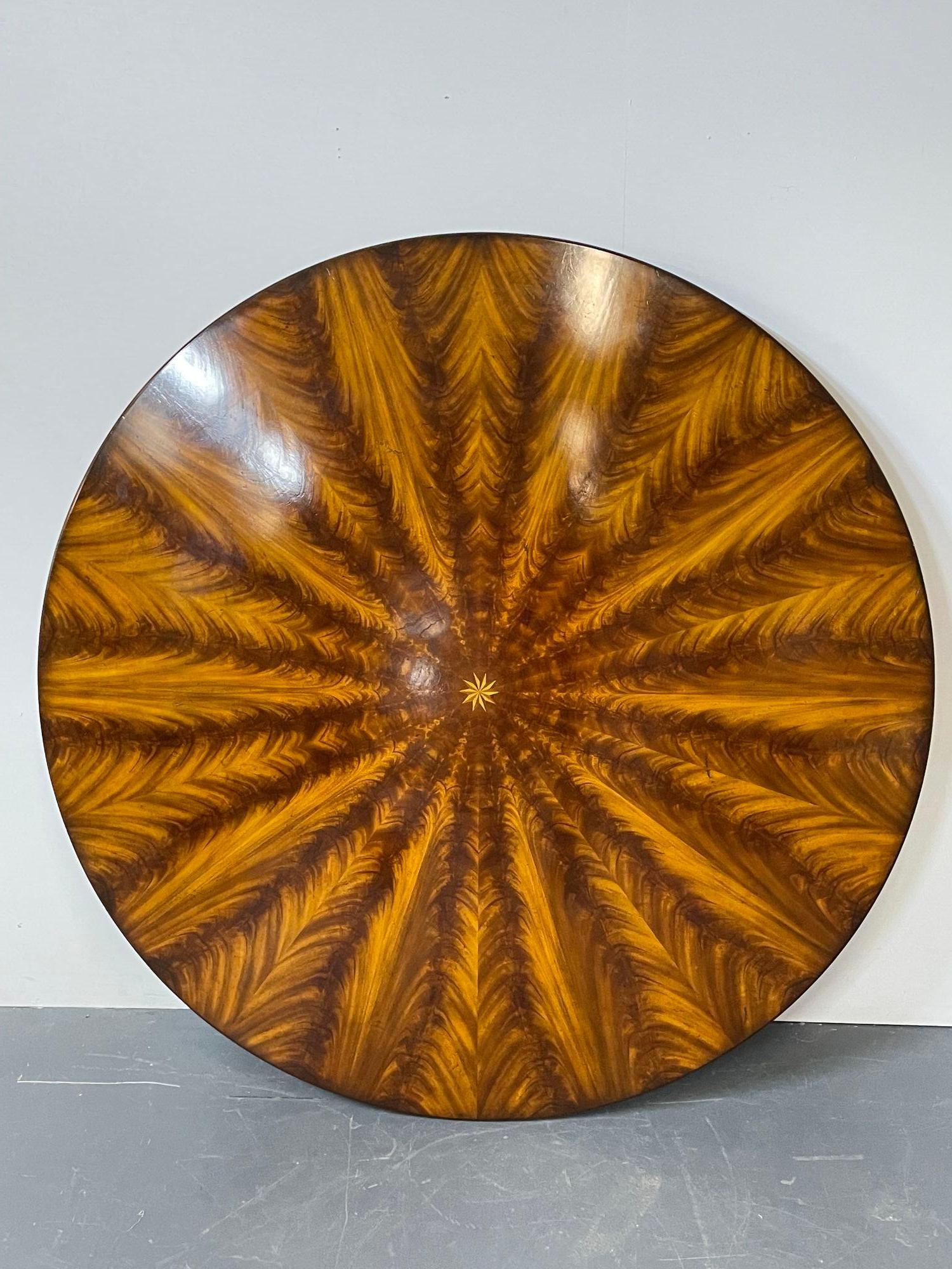 Georgian style circular sunburst dining / center table, conference table, flame mahogany, expands.

A magnificent dining or center table of flame mahogany that sits 64 inches round, with the ability to expand to 87.5 inches, in the Georgian Style.
