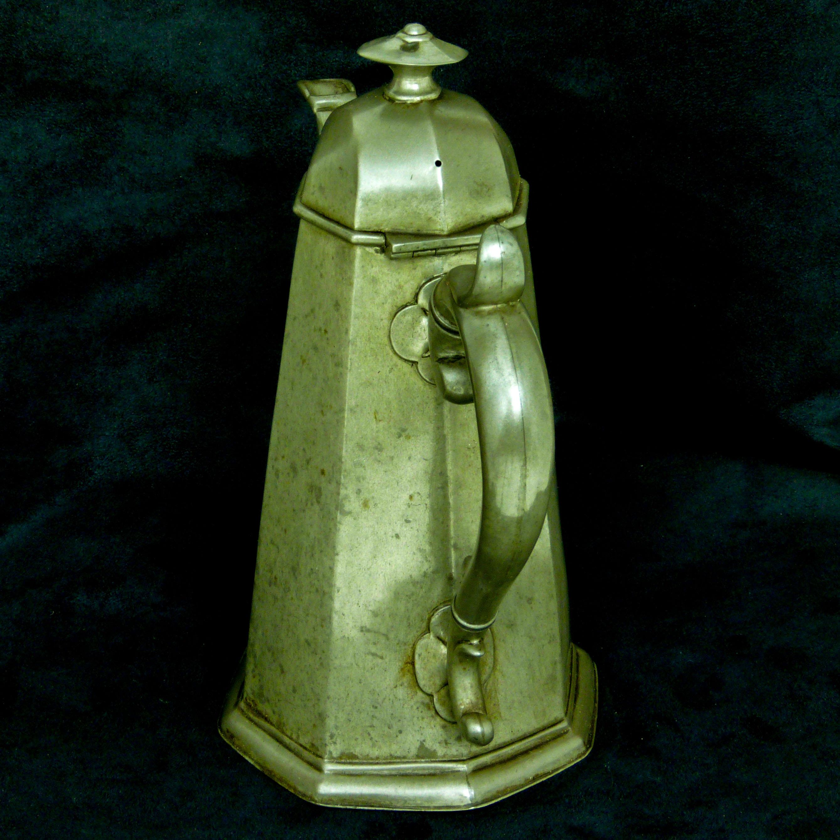 A Britannia metal Victorian coffee pot, in a more restrained 18th century style. Made in Sheffield and of warm pewter colour. A lovely elegant coffee pot in excellent condition. As with all coffee pots of this age there will be odd knocks and