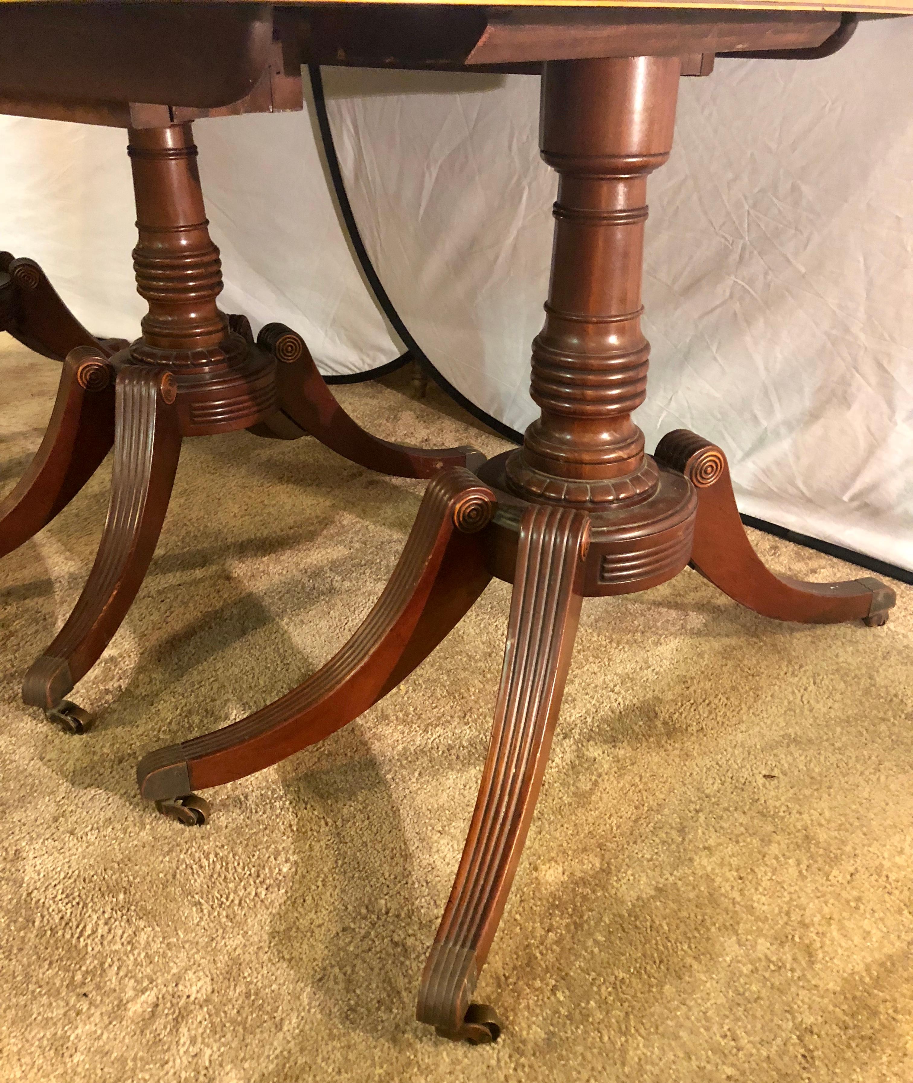 Georgian Style Crotch Mahogany Triple Pedestal Dining Table with Four Leaves 4