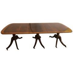 Georgian Style Crotch Mahogany Triple Pedestal Dining Table with Four Leaves