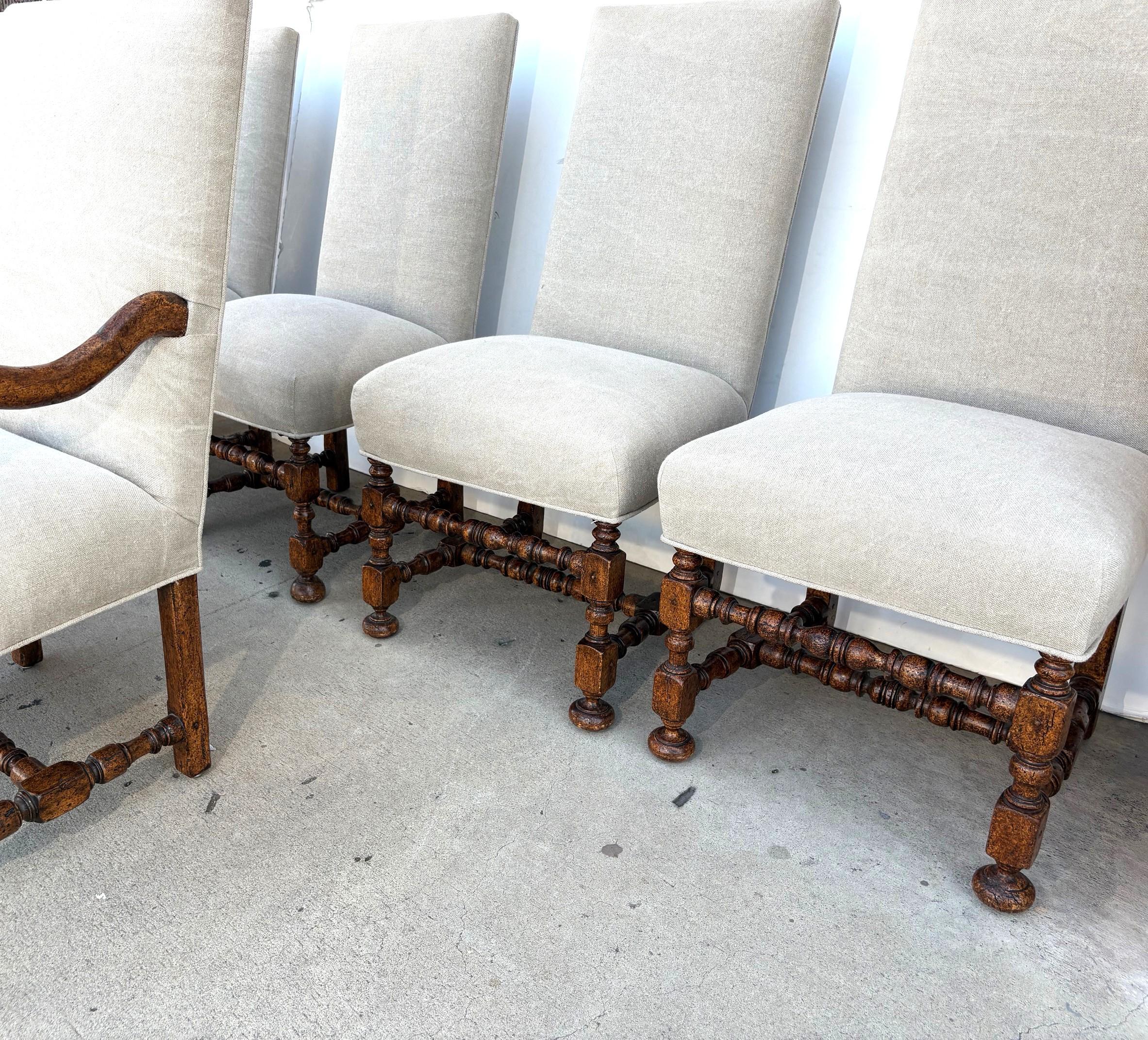 A set of 8 Early Georgian Style Dining Chairs of good quality. Two arm and six side chairs. Beautifully turned legs and stretchers. 
Armchairs 42