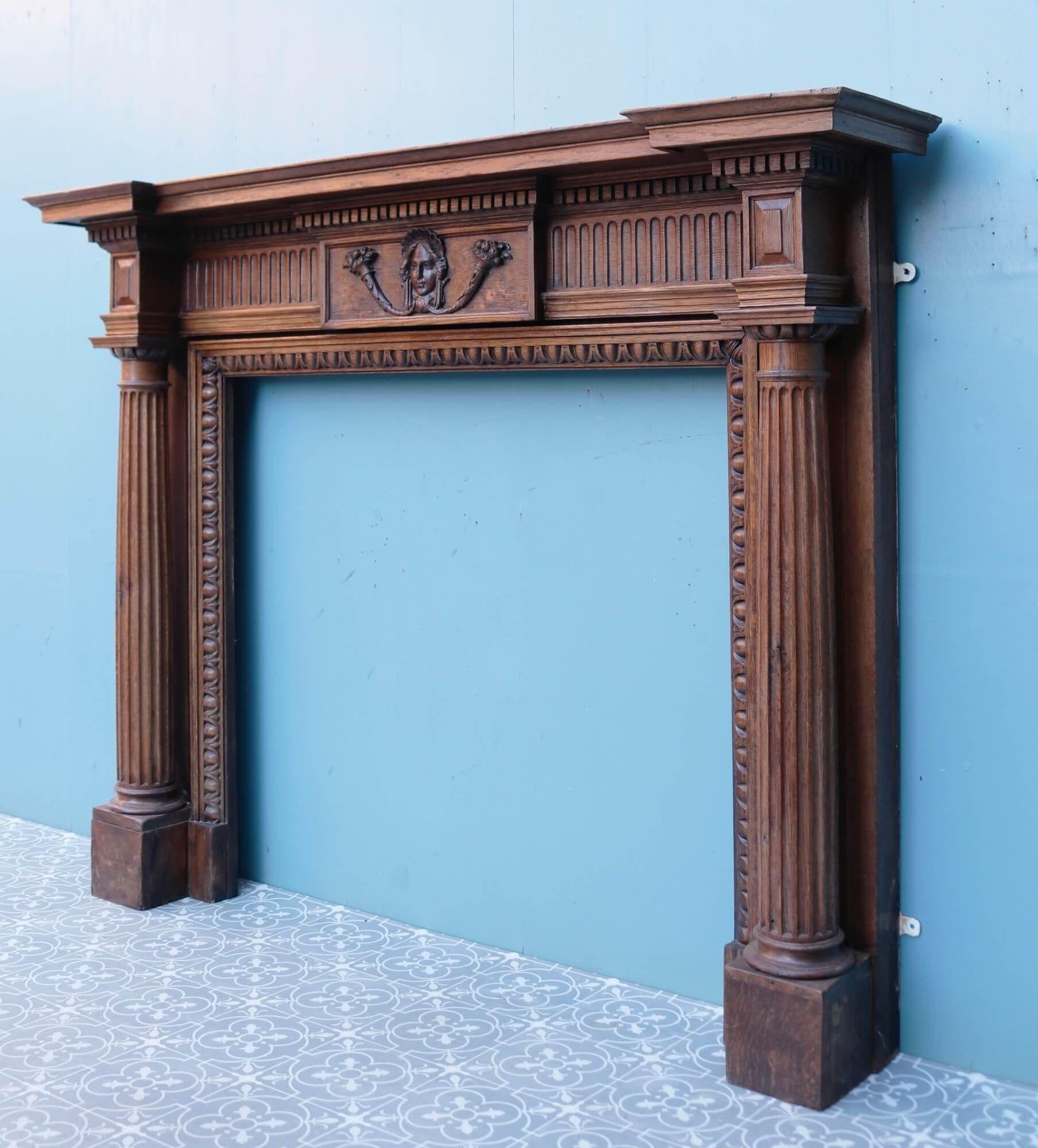 With its beautifully hand carved tablet and intricate details, this wooden mantel in the Georgian style is a spectacular surround for a large room. It features a rich caramel brown colour that instils a space with warmth and highly decorative carved