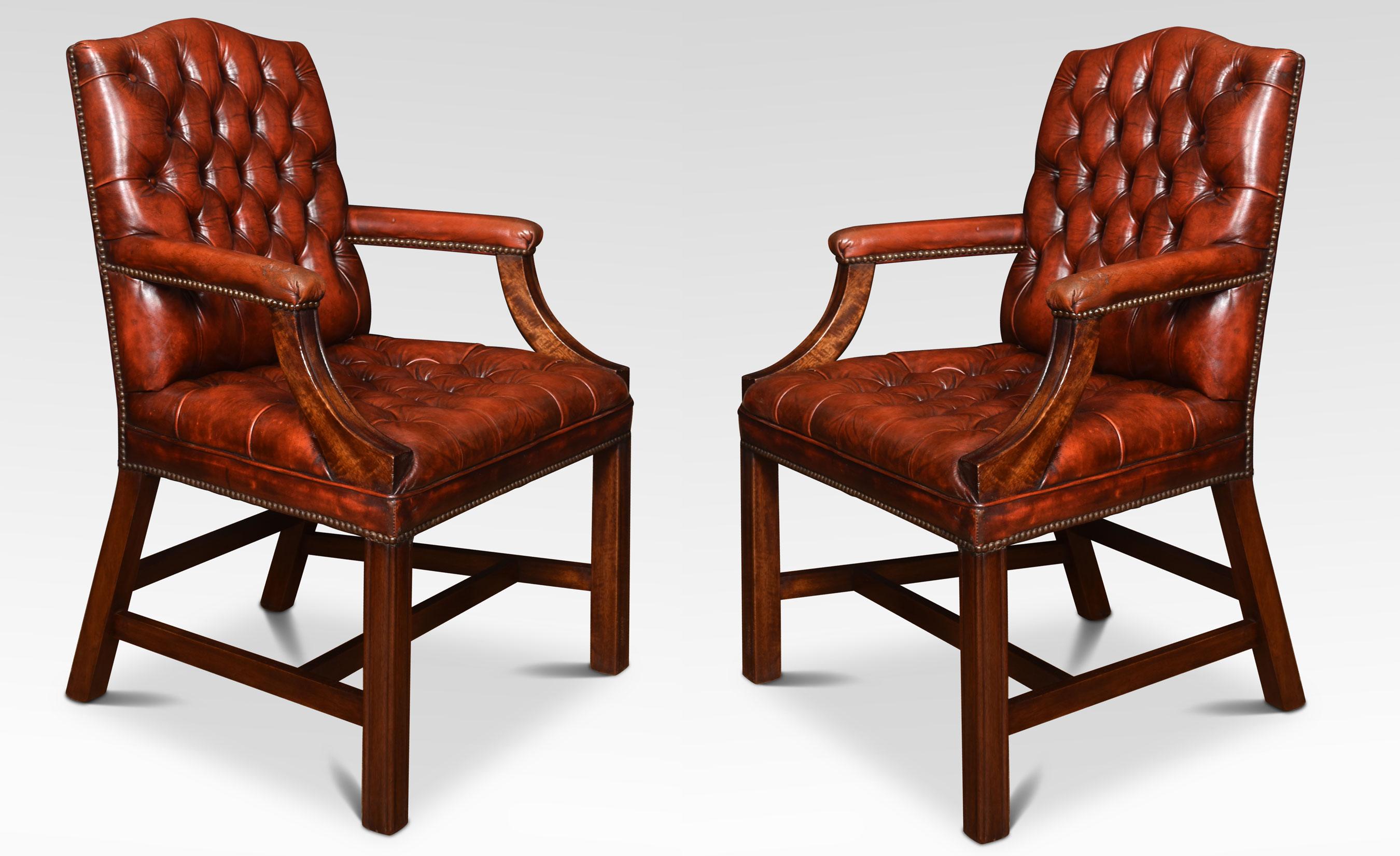 Pair Georgian style leather Gainsborough library chairs, having deep buttoned burgundy leather backs and seats with close-nailed edges. The solid walnut frame standing on square legs, united by stretcher.
Dimensions
Height 39.5 inches height to