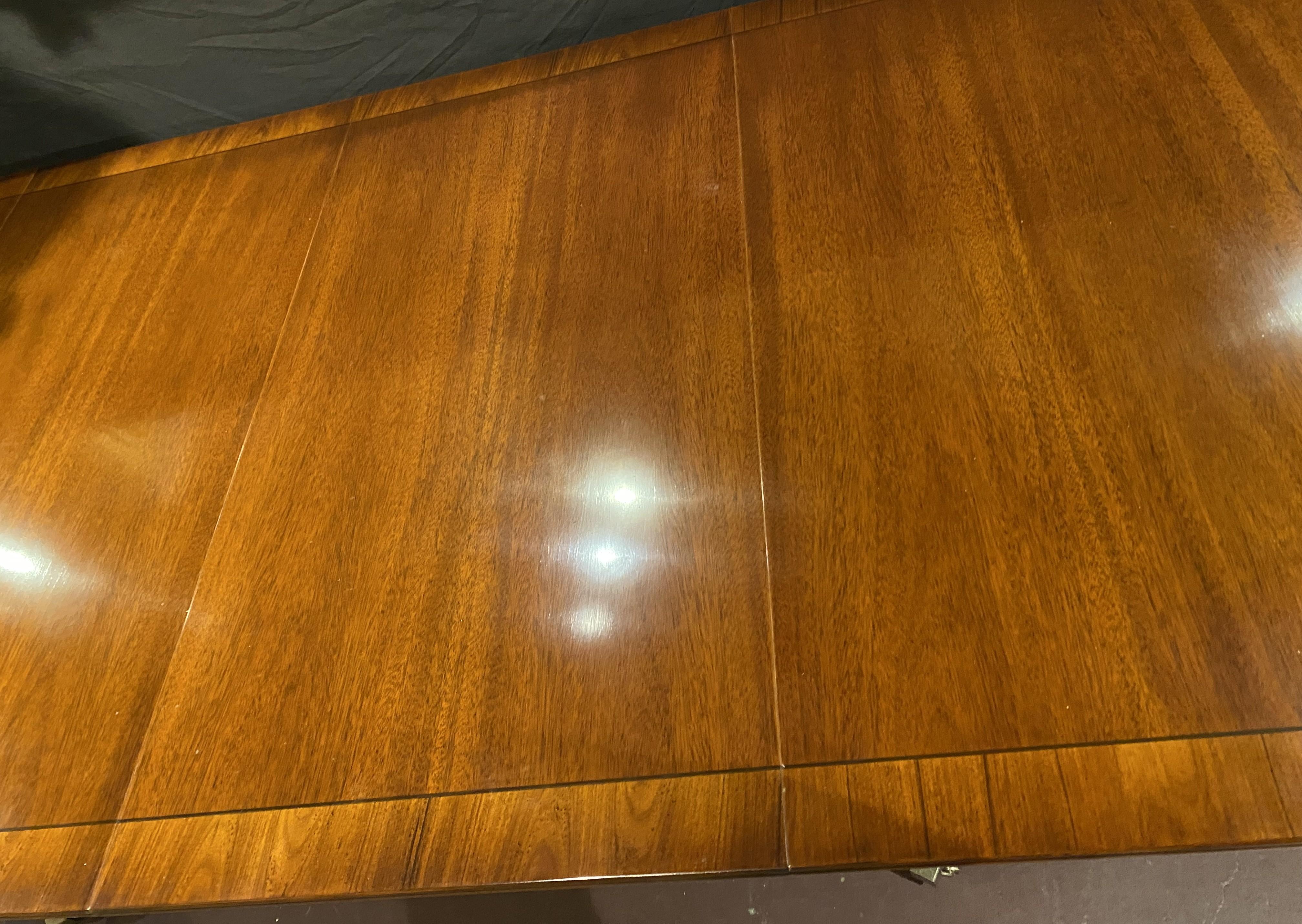English Georgian Style Mahogany Double Pedestal Banded Dining Table with Two Leaves