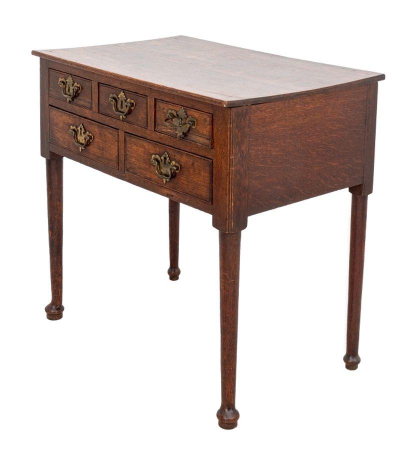 Georgian Style Oak Lowboy, three short drawers above two, with brass pulls. 29.25