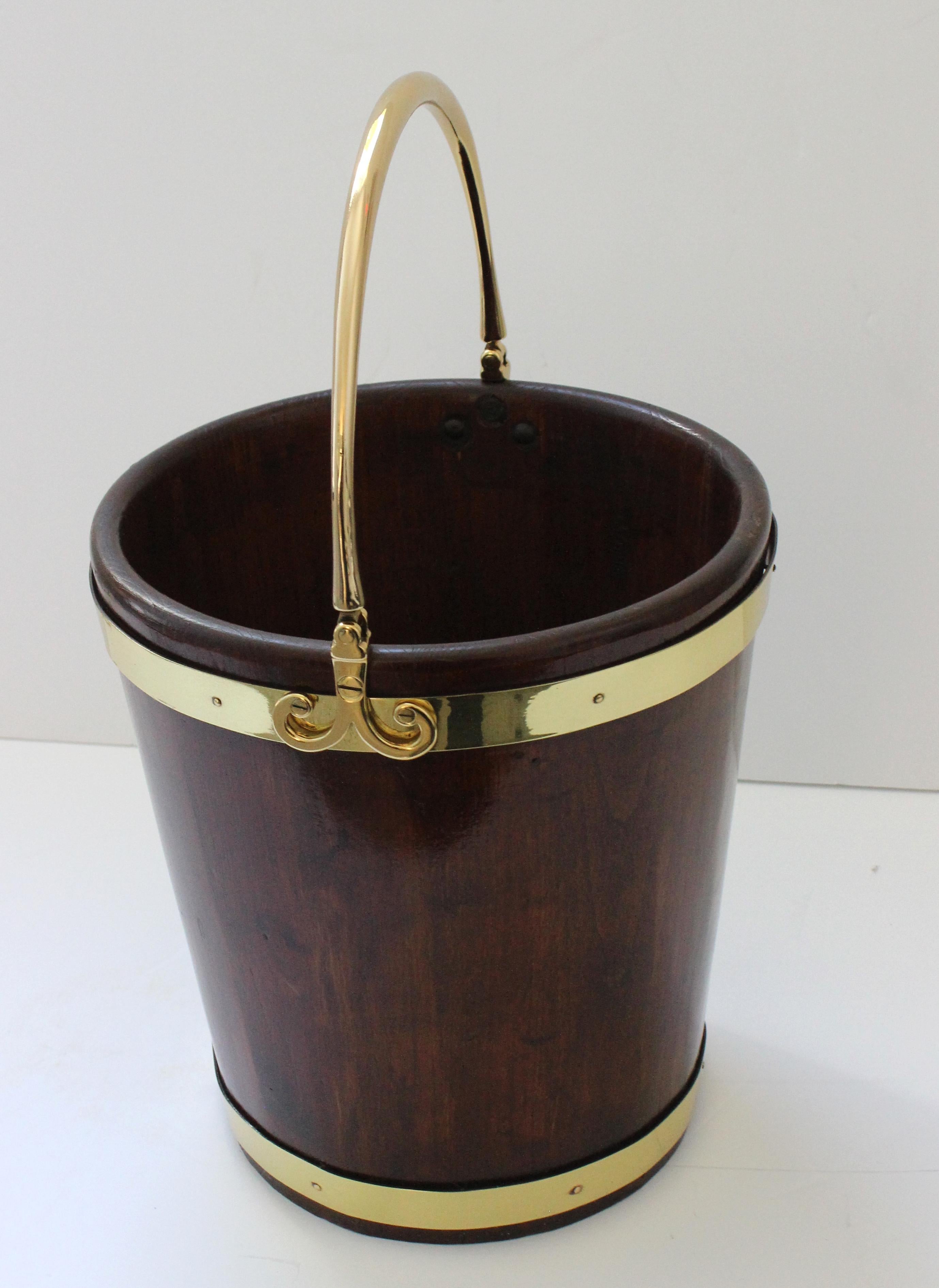 This styish peat bucket is very much in the Edwardian style and it was created by the spanish workshop of Valenti.

Note: The piece has been professionally restored and the brass polished and finished with a clear lacquer coating.

Note: Overall