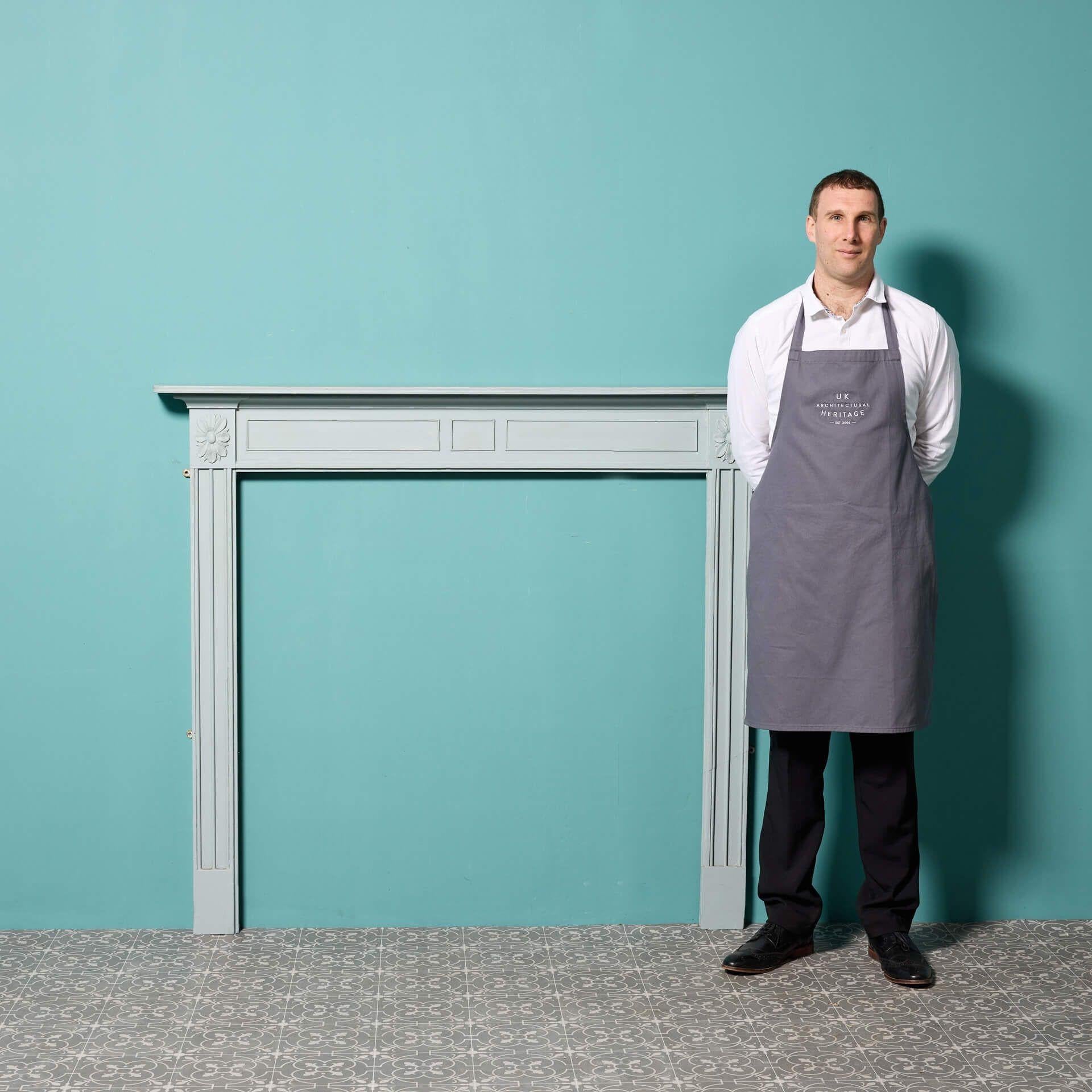 An English Georgian style fire surround constructed from pine, finished in a duck egg blue paint.

There are two of these fire surrounds available.

Additional dimensions:
Opening height 113.5 cm

Opening width 115 cm

Width between outside