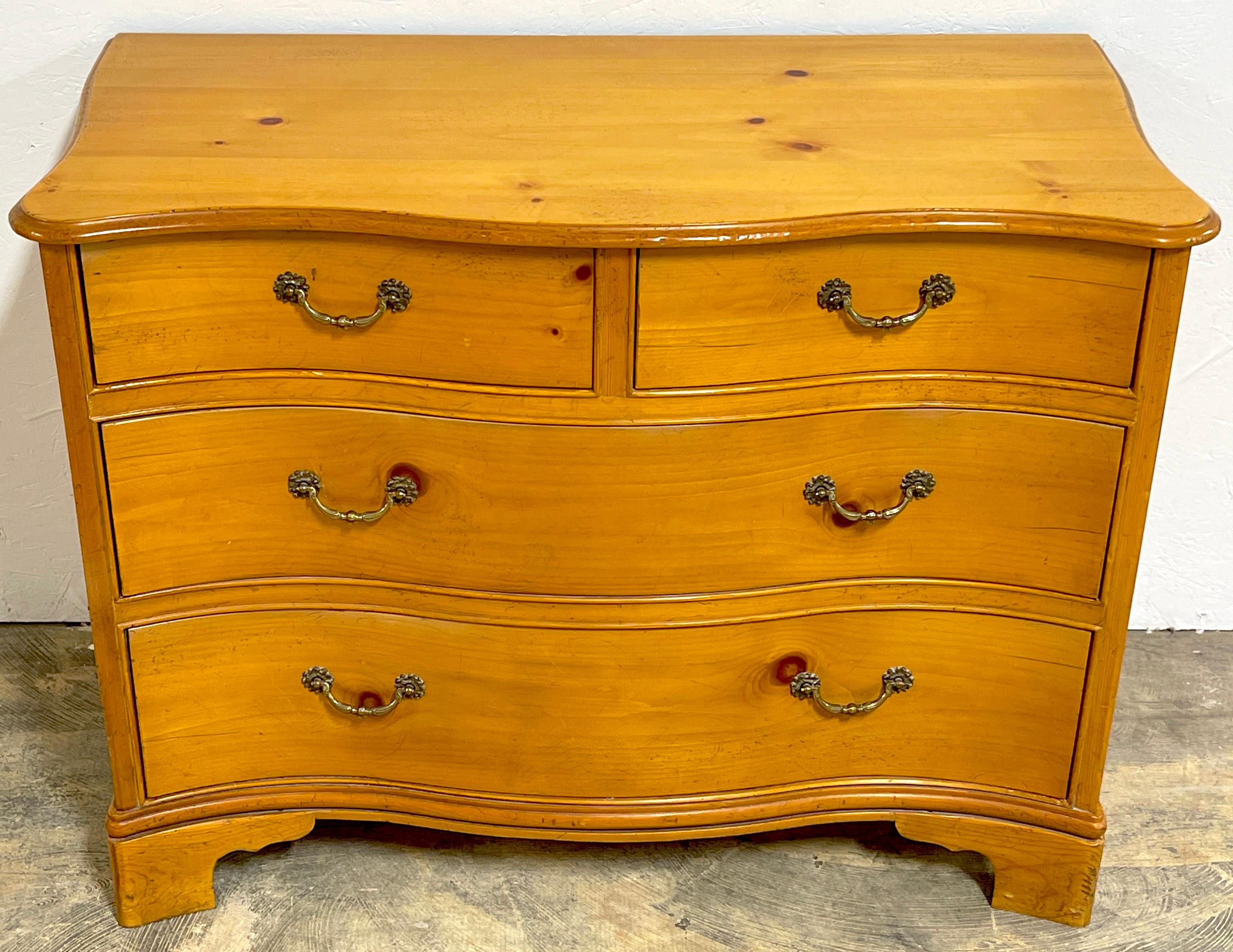 Georgian Style Pine Serpentine Chest, By Baker
USA, circa 1960s

Georgian style pine serpentine by Baker and originating from the USA in the 1960s, is a beautifully crafted piece of furniture. It reflects the elegant and timeless design elements of