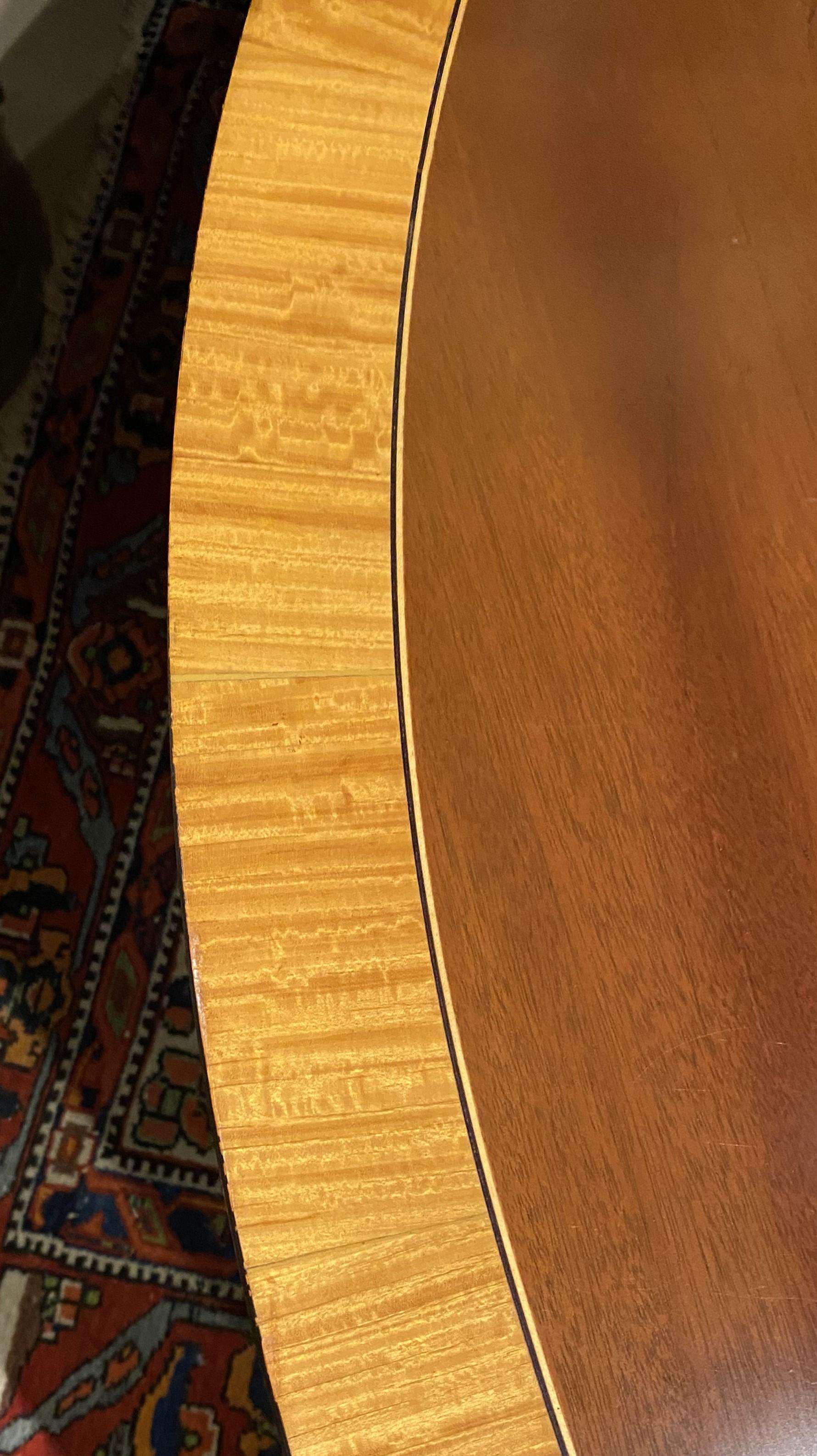 20th Century Georgian Style Round Banded Mahogany Dining Table with Outswept Legs