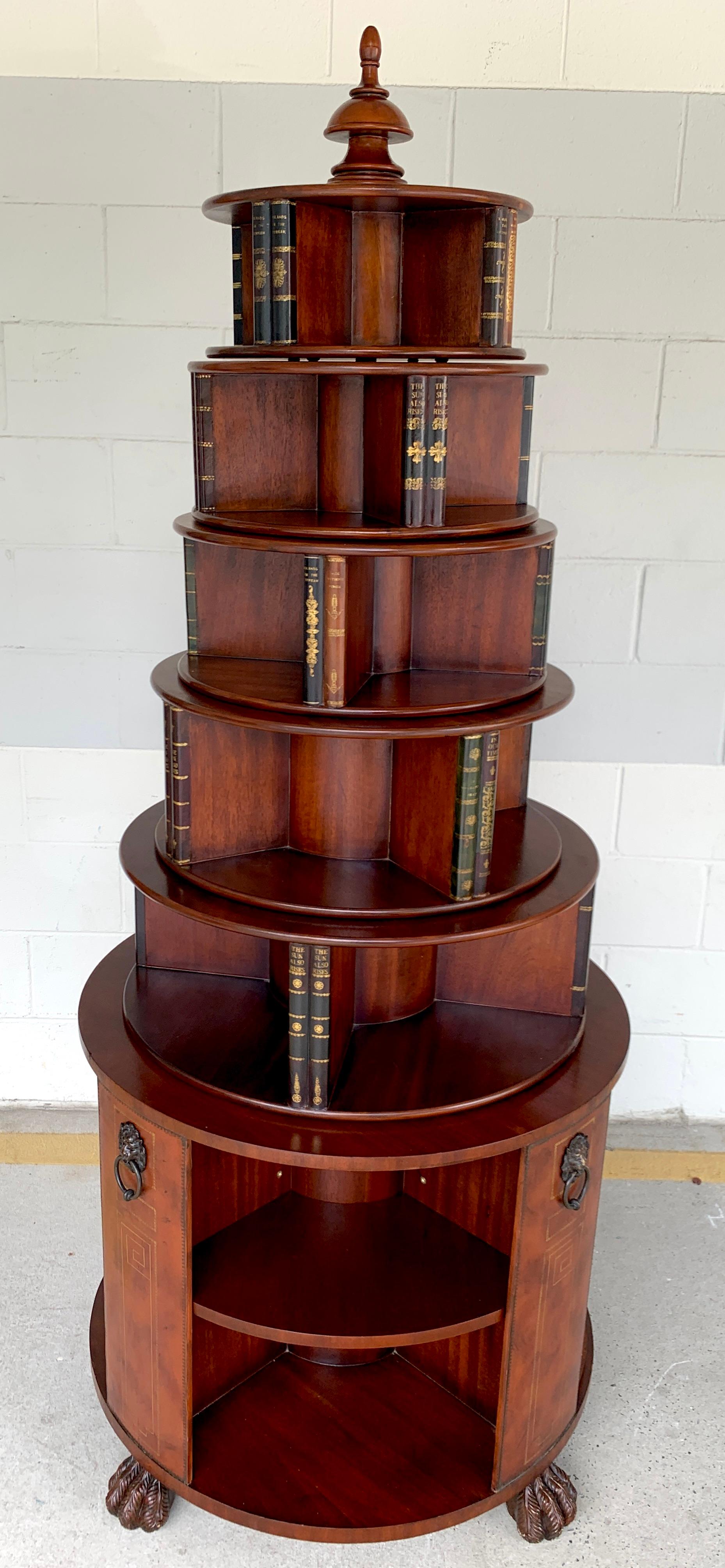 Georgian style six-tier faux book motif leather embossed revolving bookcase, impressive mahogany and embossed leather book motif revolving bookcase consisting of six graduating tiers.
Base 32