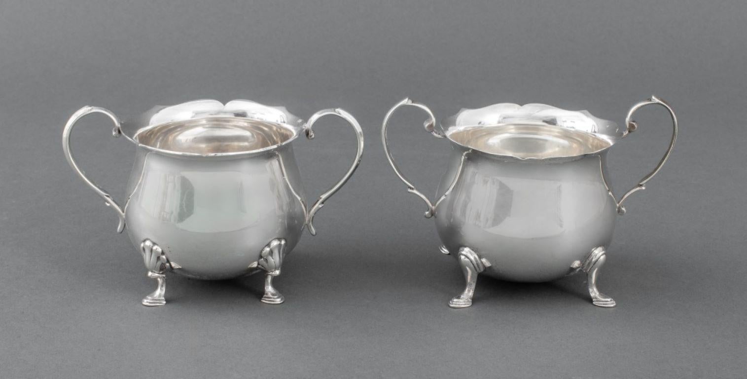 Group of four (4) Georgian style sterling silver tea articles, all marked 