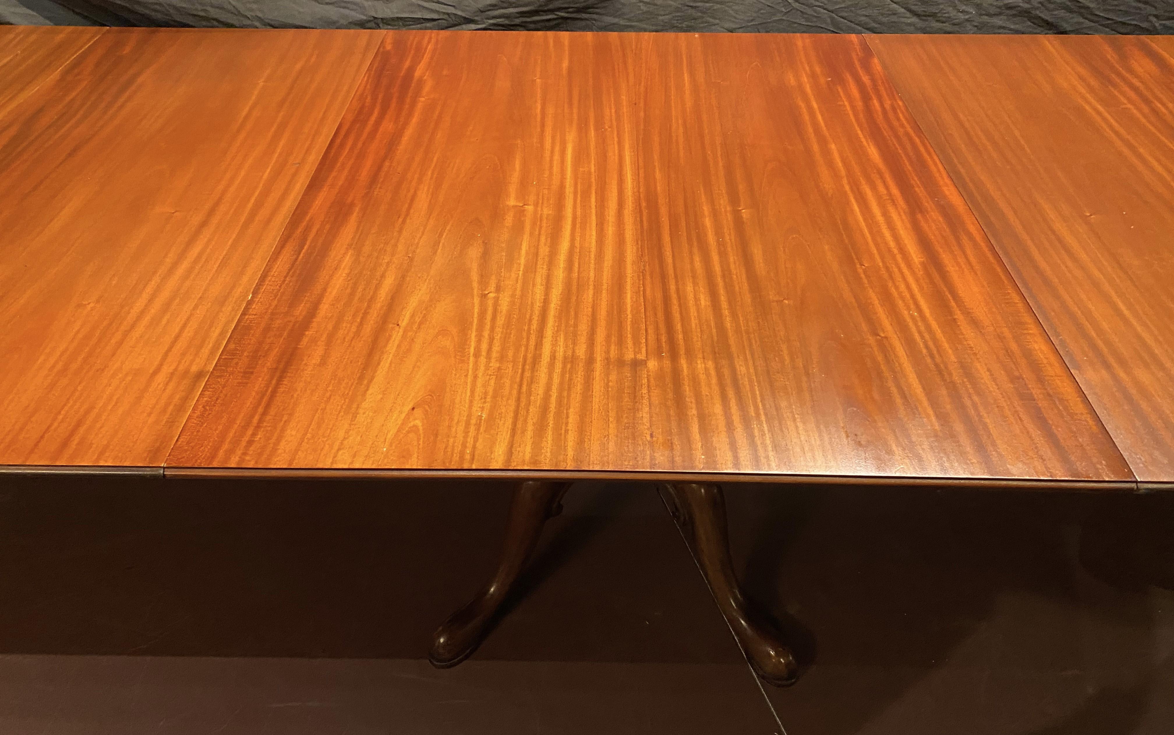 English Georgian Style Walnut or Mahogany Triple Pedestal Dining Table with Two Leaves