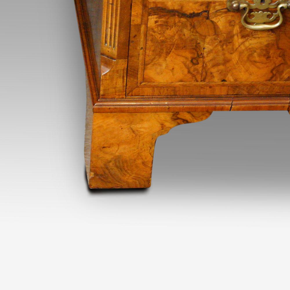Georgian style walnut pedestal desk bracket foot
This Georgian style walnut pedestal desk was made, circa 1900.
The cabinet maker has used antique elements in the construction, and so it gives it a Georgian feel, especially the fine oak drawer