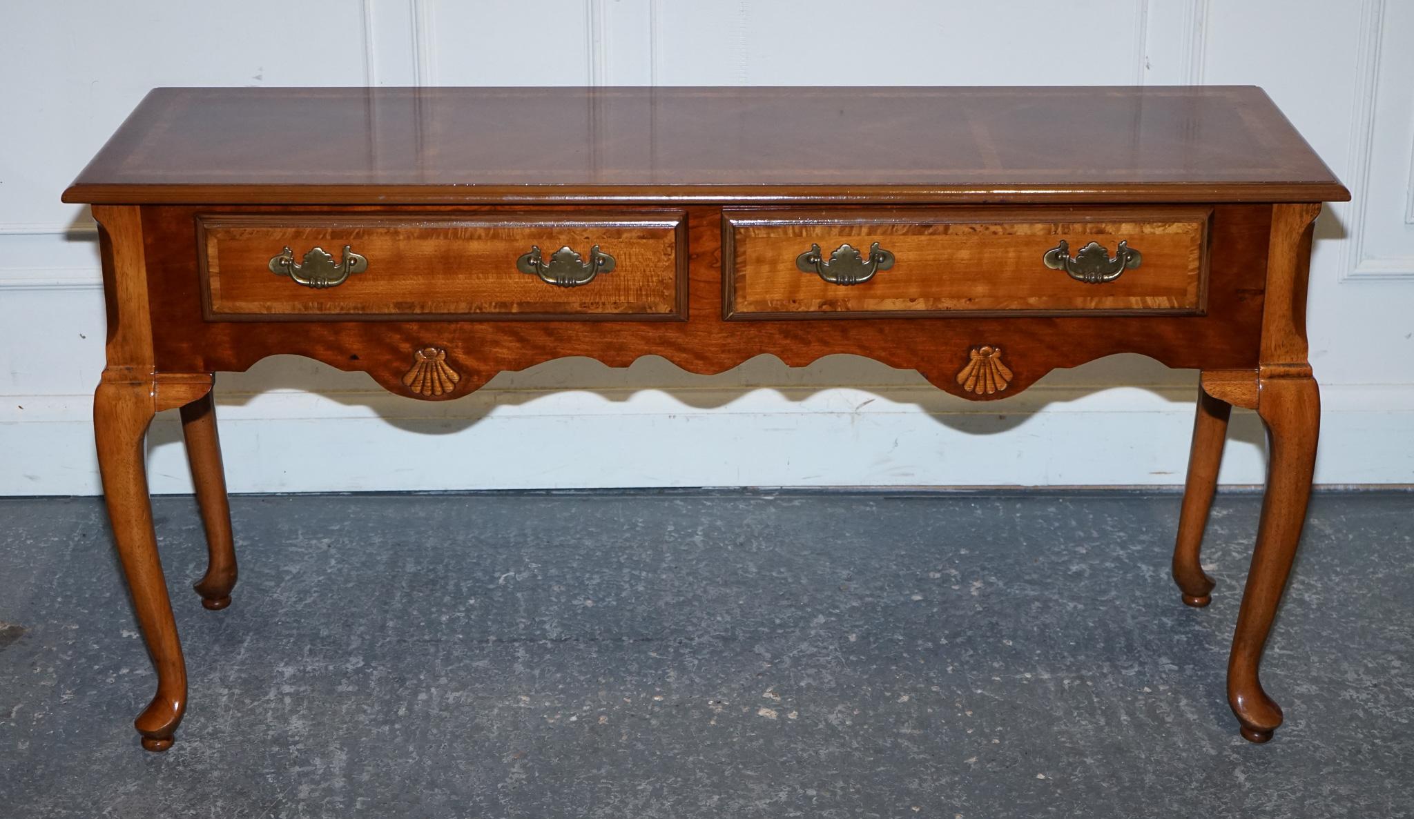 
Antiques of London


A refined Georgian-style walnut side console table, crafted in the 1980s and designed with all the grace and charm of traditional 18th-century English furniture. The table features beautifully shaped cabriole legs, a hallmark