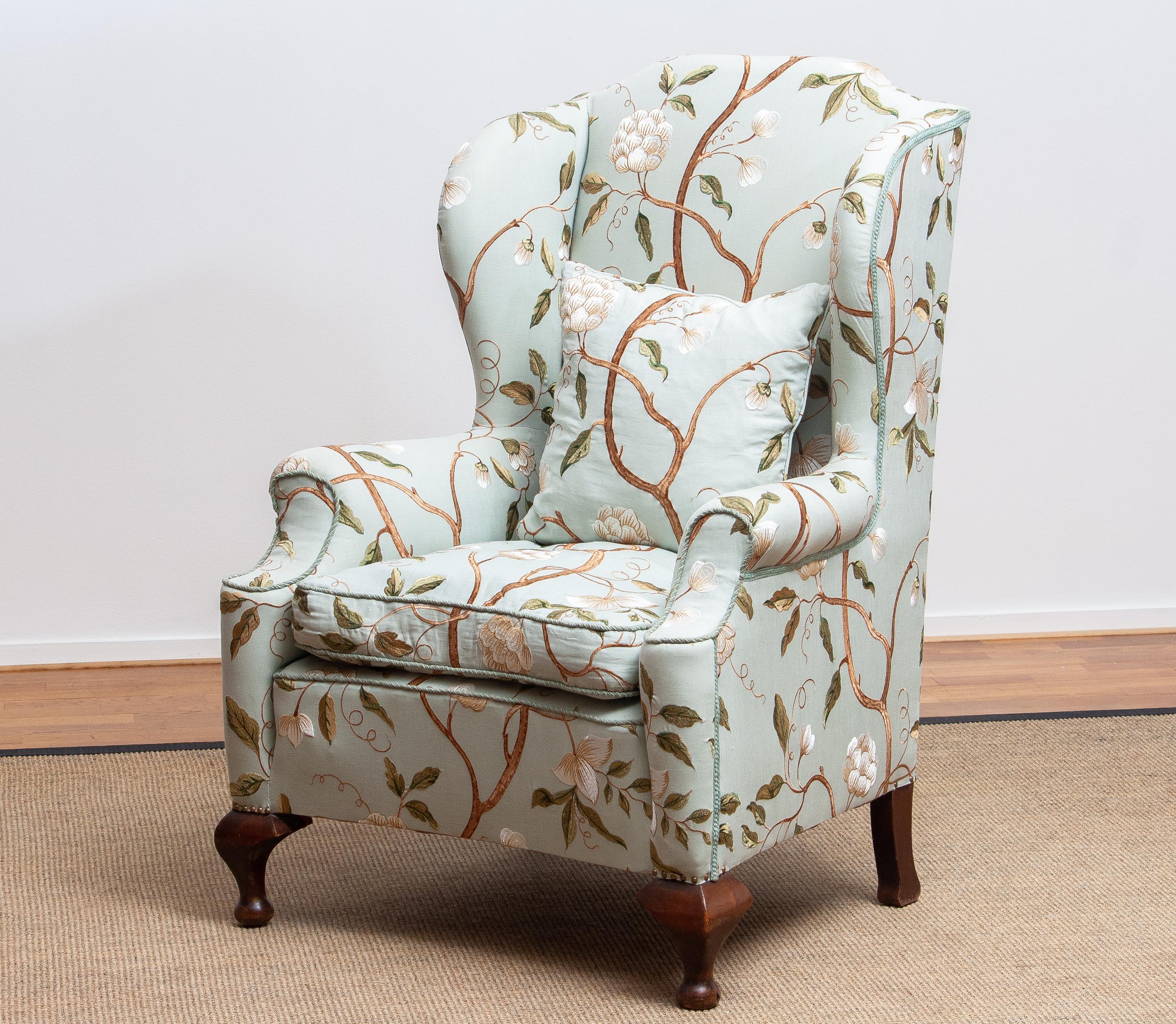 Extremely beautiful and comfortable Georgian wingback chair upholstered with embroidered fabric in very good condition.
This wingback chair is recently completely restored. New bindings - fillings - springs and very exclusive fabric.
The seat