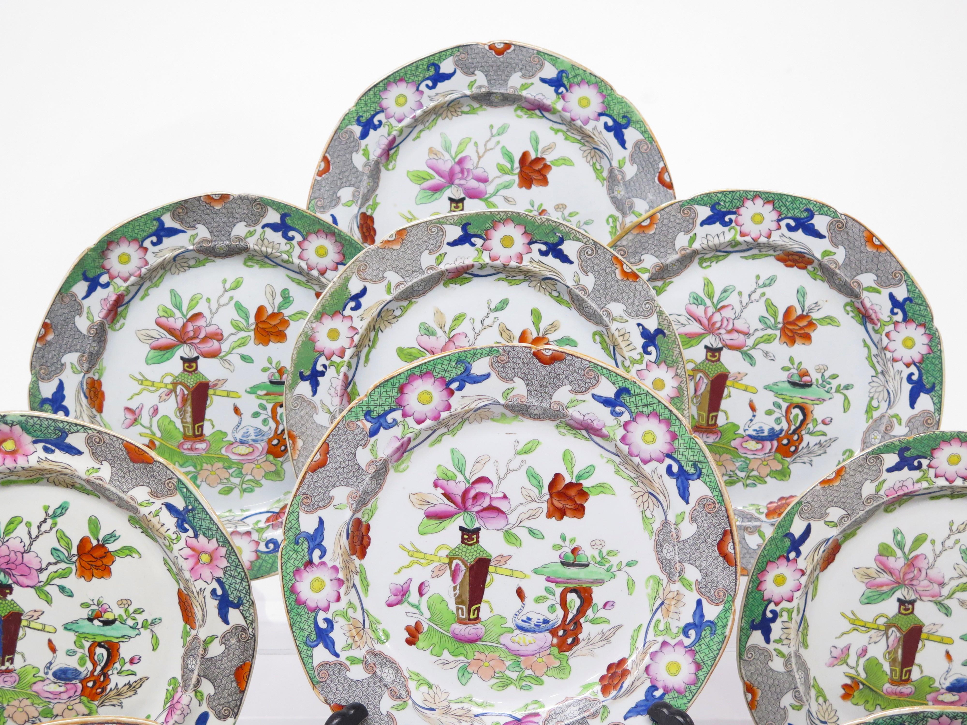 This is a group of fourteen (14) hand-painted Mason's Ironstone luncheon plates, in the 
