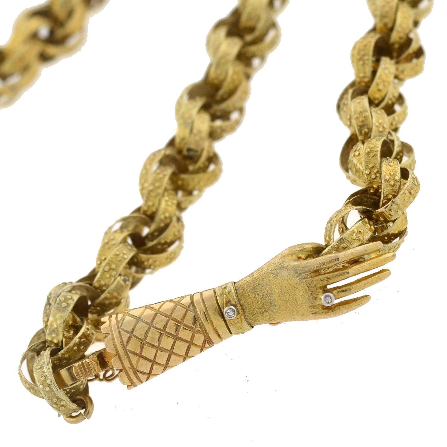 An absolutely exquisite and rare textured link chain from the Georgian (ca1750) era! This beautiful handmade piece is crafted in 12kt yellow gold and is comprised of interlocking round links, which together form a gorgeous twisted rope design. Each