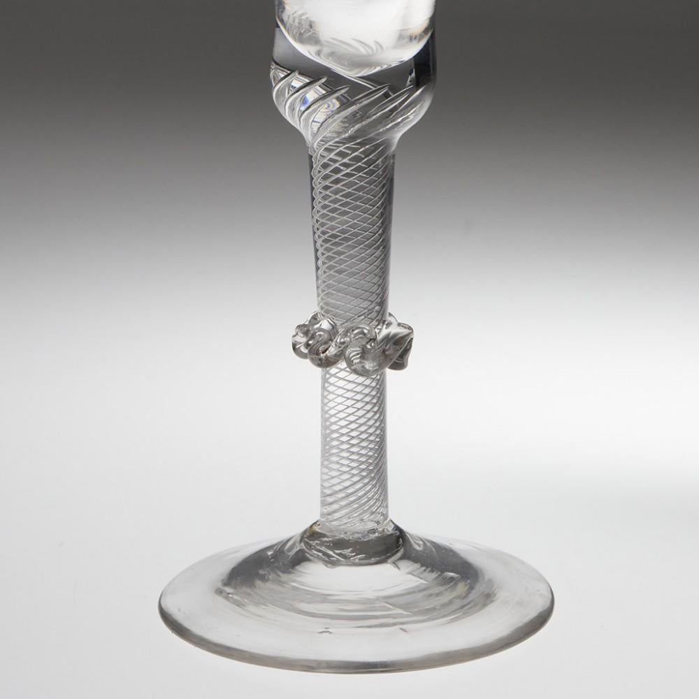 Heading : Vermicular collar air twist wine glass c1760
Period : George II- George III
Origin : England
Colour : Clear
Bowl : Bell
Stem : Vermicular ( also known as vermiform- 