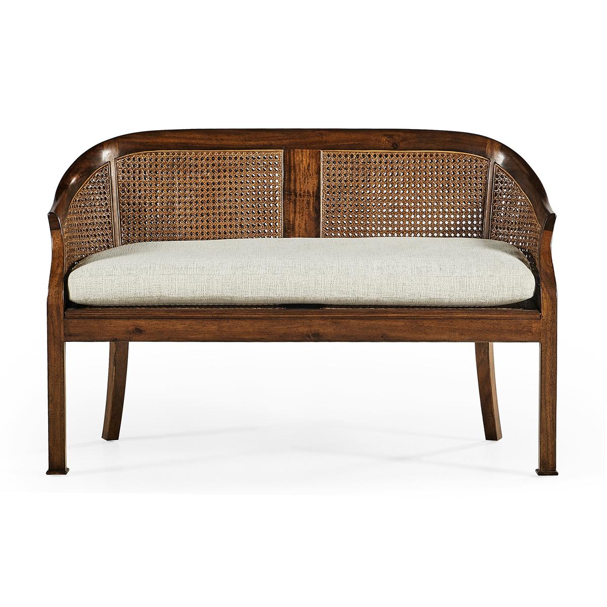 Georgian walnut two seater salon style settee with caned back and neutrally upholstered drop-in cushion, sweeping back rail and arms and with simple block feet.

Dimensions: 51.5