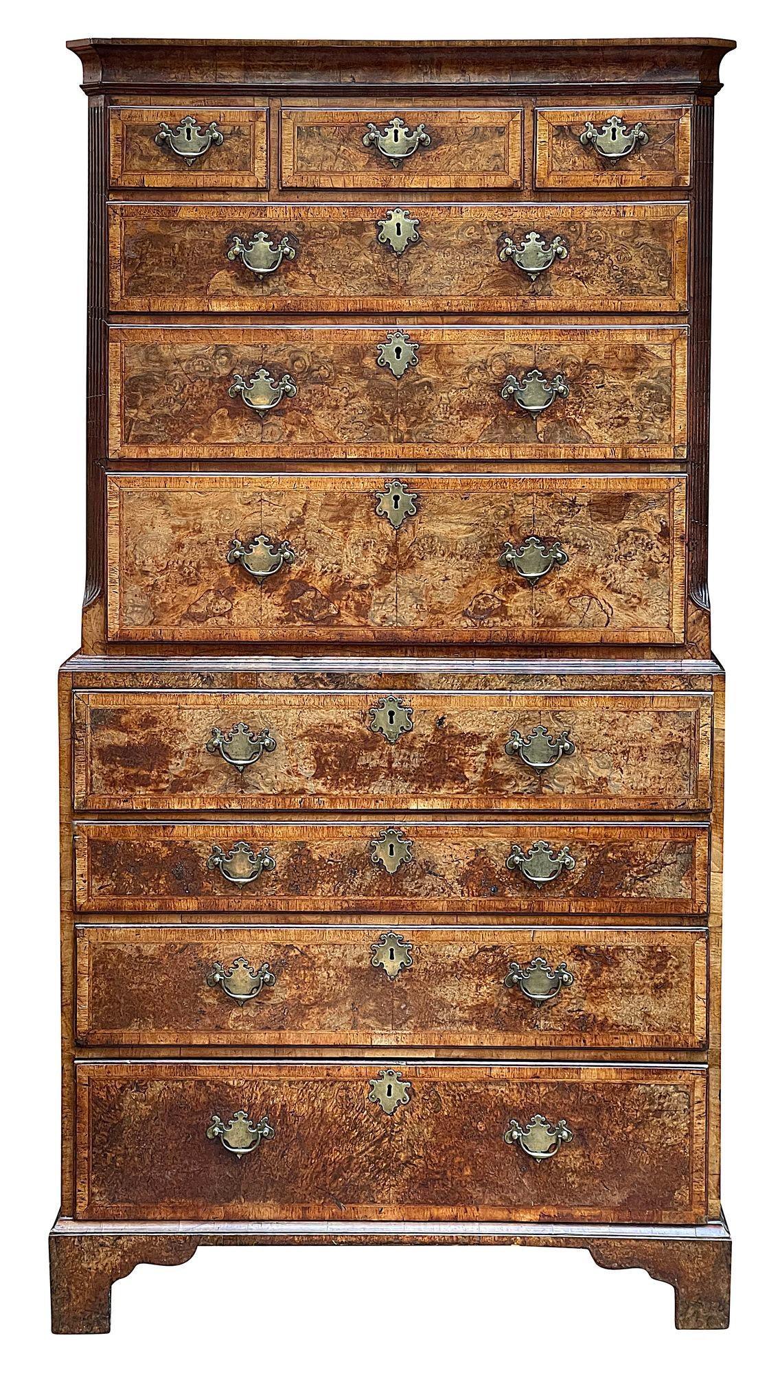 A fine quality and rare Georgian period Walnut Tallboy with a secretaire drawer, having wonderful fluted canted corners, having the original brass handles to the drawer fronts and side carrying handles. Crossbanded drawer fronts, Oak lined and