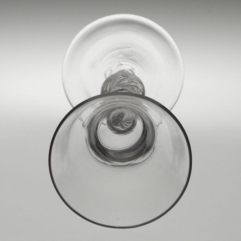 Copa de Vino Georgiana con Tallo Giratorio de Aire y Cuenco con Cazoleta mediados del siglo XVIII en venta