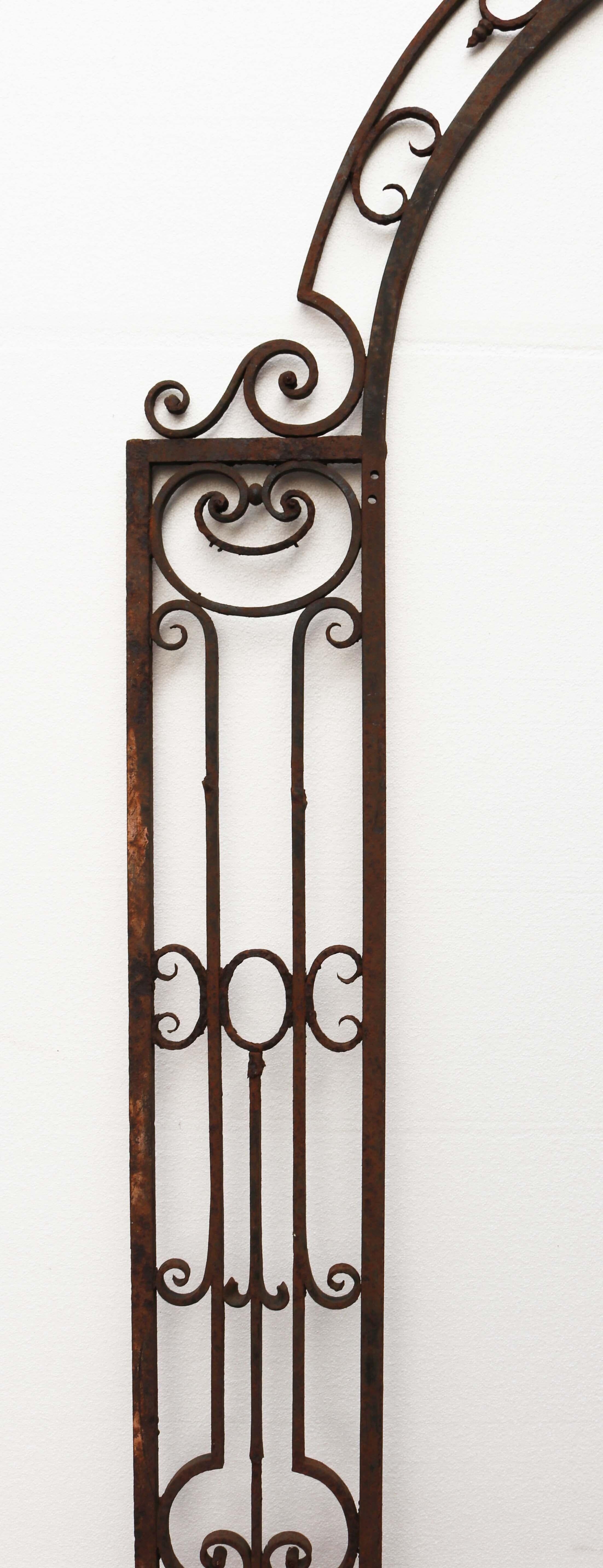 Georgian wrought iron garden archway. A Georgian and Regency style, iron archway with decorative reticulated scrollwork panels.



Additional Dimensions

Opening height of approx. 205 cm

Opening width of approx. 127 cm.