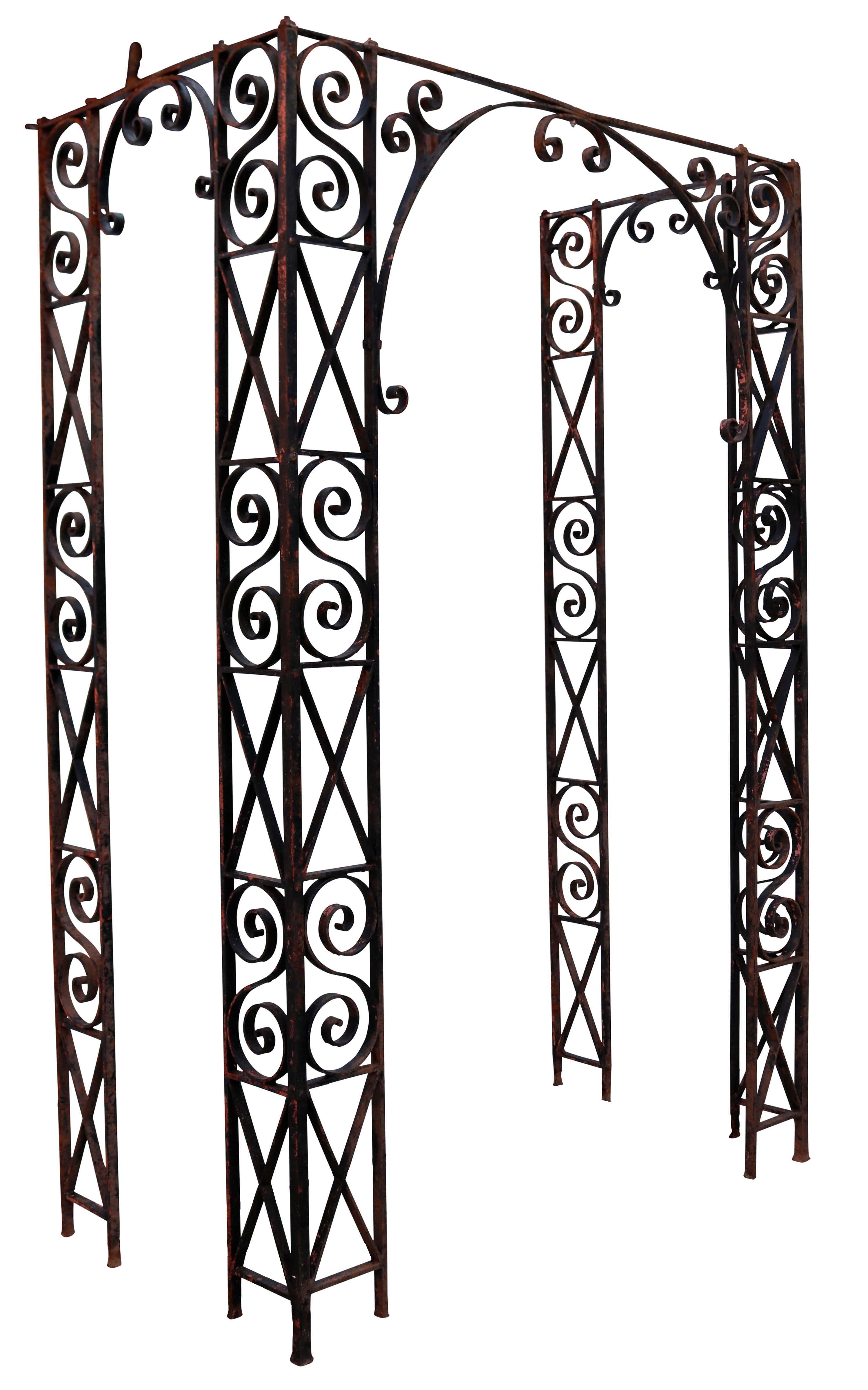 Georgian Wrought Iron Porch Frame. With scroll and cross decoration, dating to circa 1800. There is a temporary frame work at the bottom, for support.

Originally situated in a local farmhouse. Blacksmith made. This could also be used as a garden