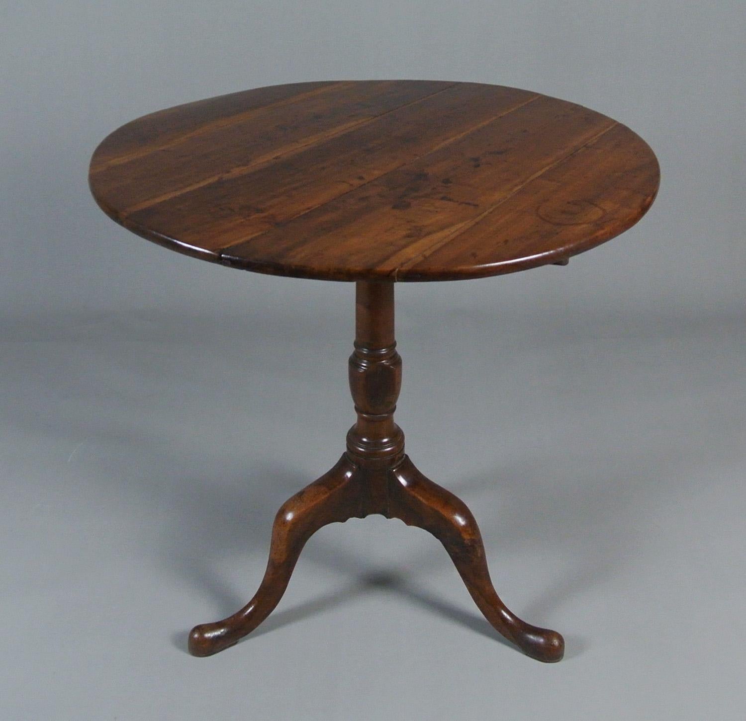 In excellent and original condition, this is a beautiful late 18th century tilt top table in solid yew wood which has developed a truly fabulous colour.

The table is heavy and robust, the top opens smoothly and locks with a simple iron flat plate