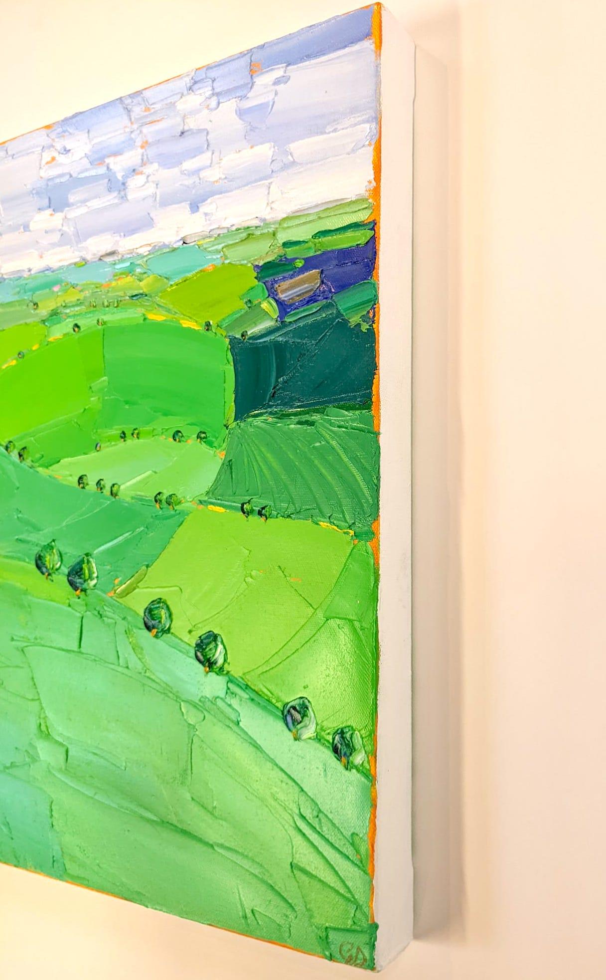 his painting depicts a view of patchwork fields in the Cotswolds portrayed by thick strokes of paint applied with a palette knife, exploring the variety of shapes and colours we see in the landscape. A photograph was taken on horseback as a