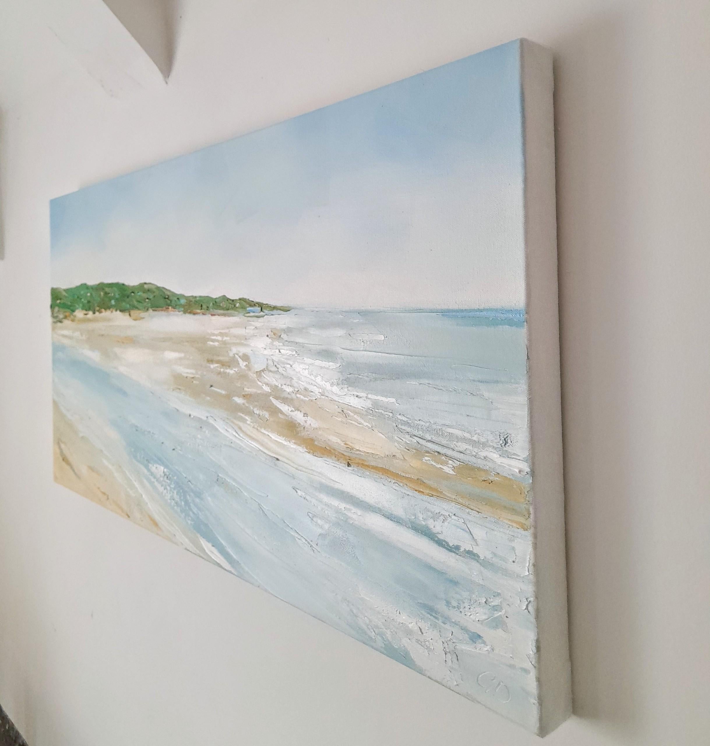 An original oil painting on canvas portraying the view across the beach from Gwbert, Cardigan bay in West Wales. White cottages in the hills typical of the welsh landscape look across the quiet beach. The hills and houses are built up of thick paint