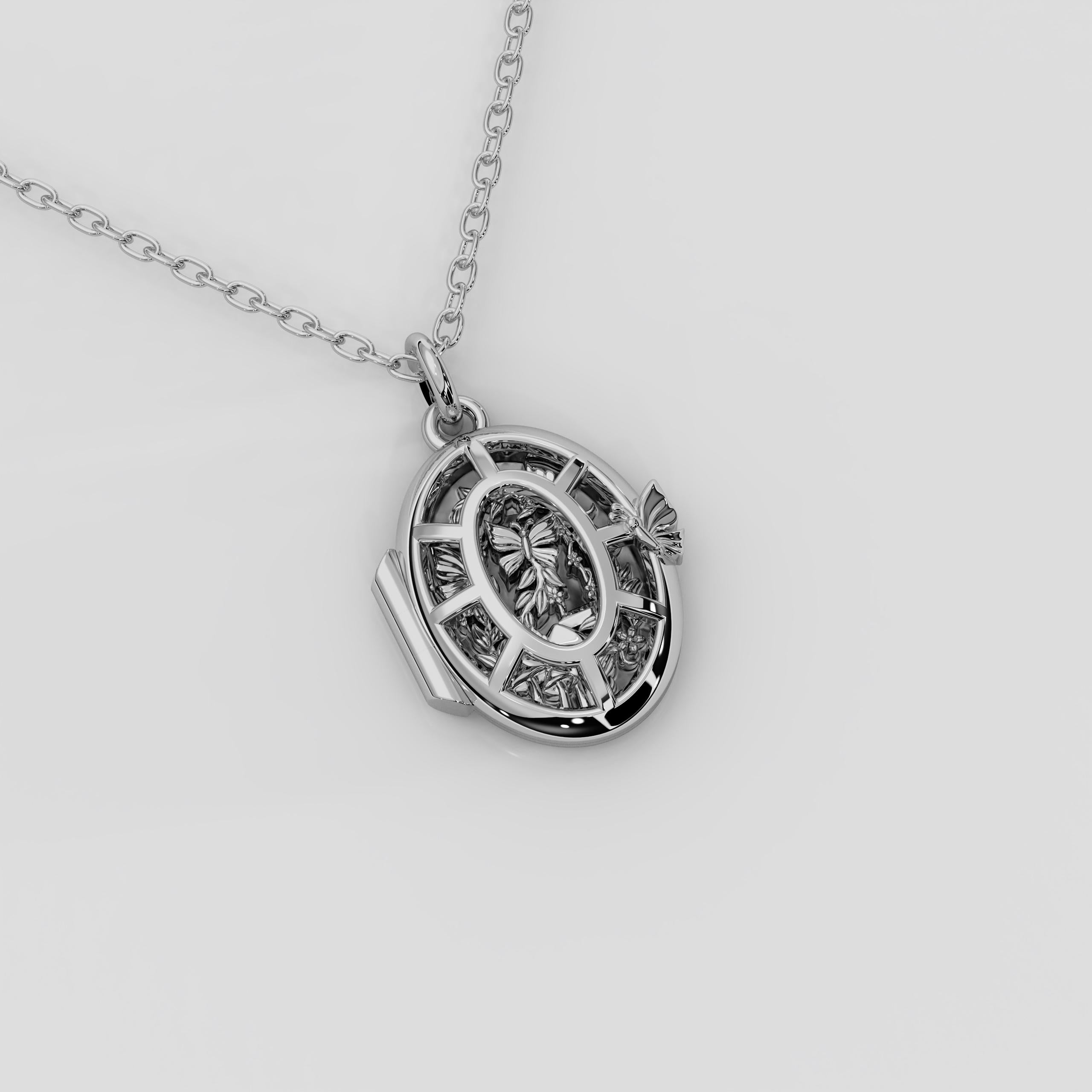 Platinum 'Fairytale' Locket from Georgina Yvonne's award winning 'Wonderland' Collection, with beautiful fairyland detail including butterflies, flowers, leaves and mushrooms. 

The Fairytale Locket is a 'window' scene - the locket sees you gazing