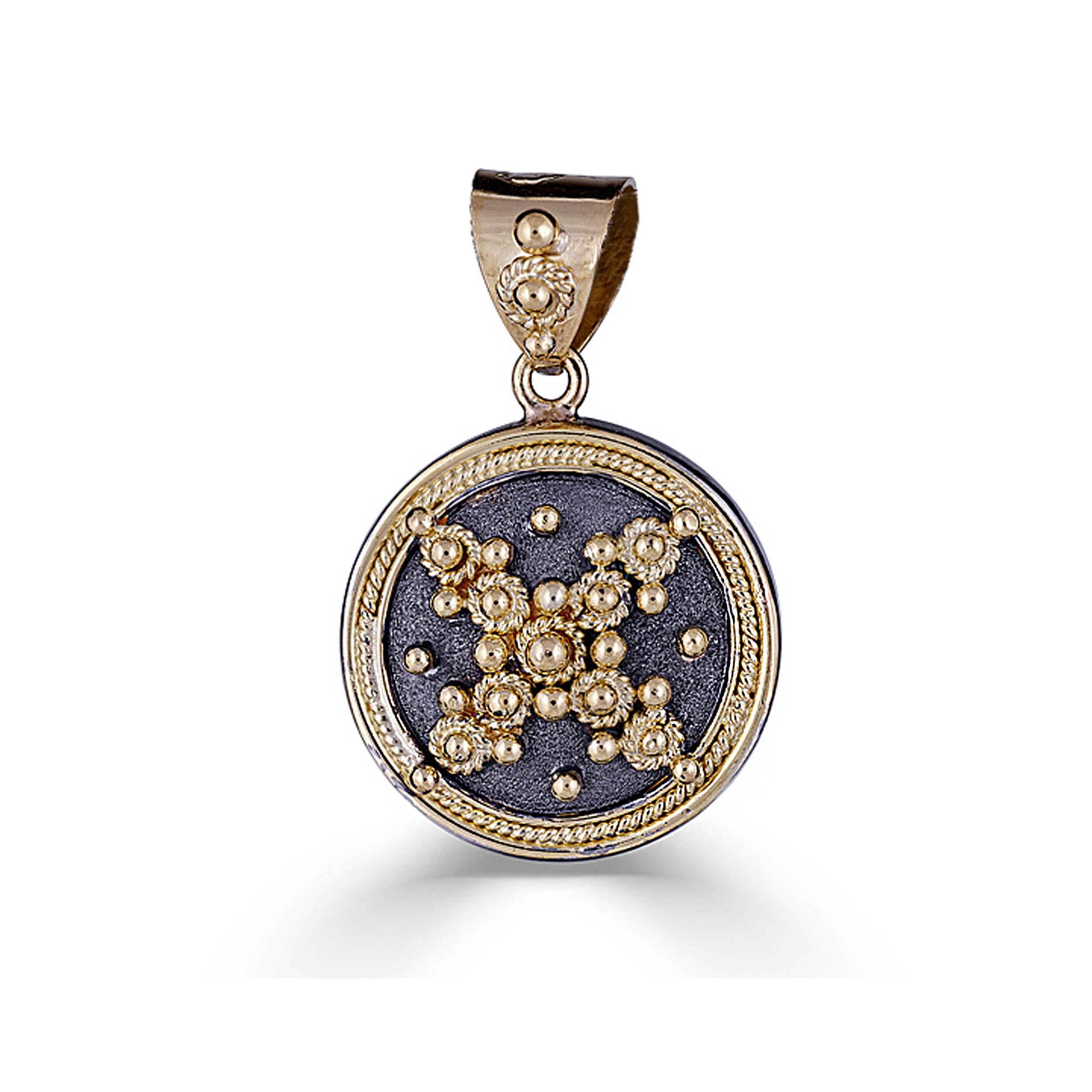 S.Georgios unique designer pendant is all handmade from solid 18 Karat yellow Gold. This pendant is microscopically decorated - it has granulation work all the way around with gold beads and wires shaped as the last letter of the Greek Alphabet -