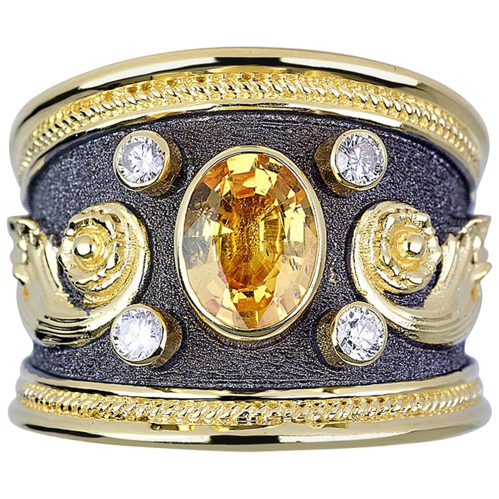 Bague jonc bicolore en or 18 carats avec saphir jaune et diamants de la collection Georgios