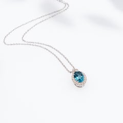 Georgios Collection 18 Karat White Gold Oval Blue Topaz Pendant With Diamonds