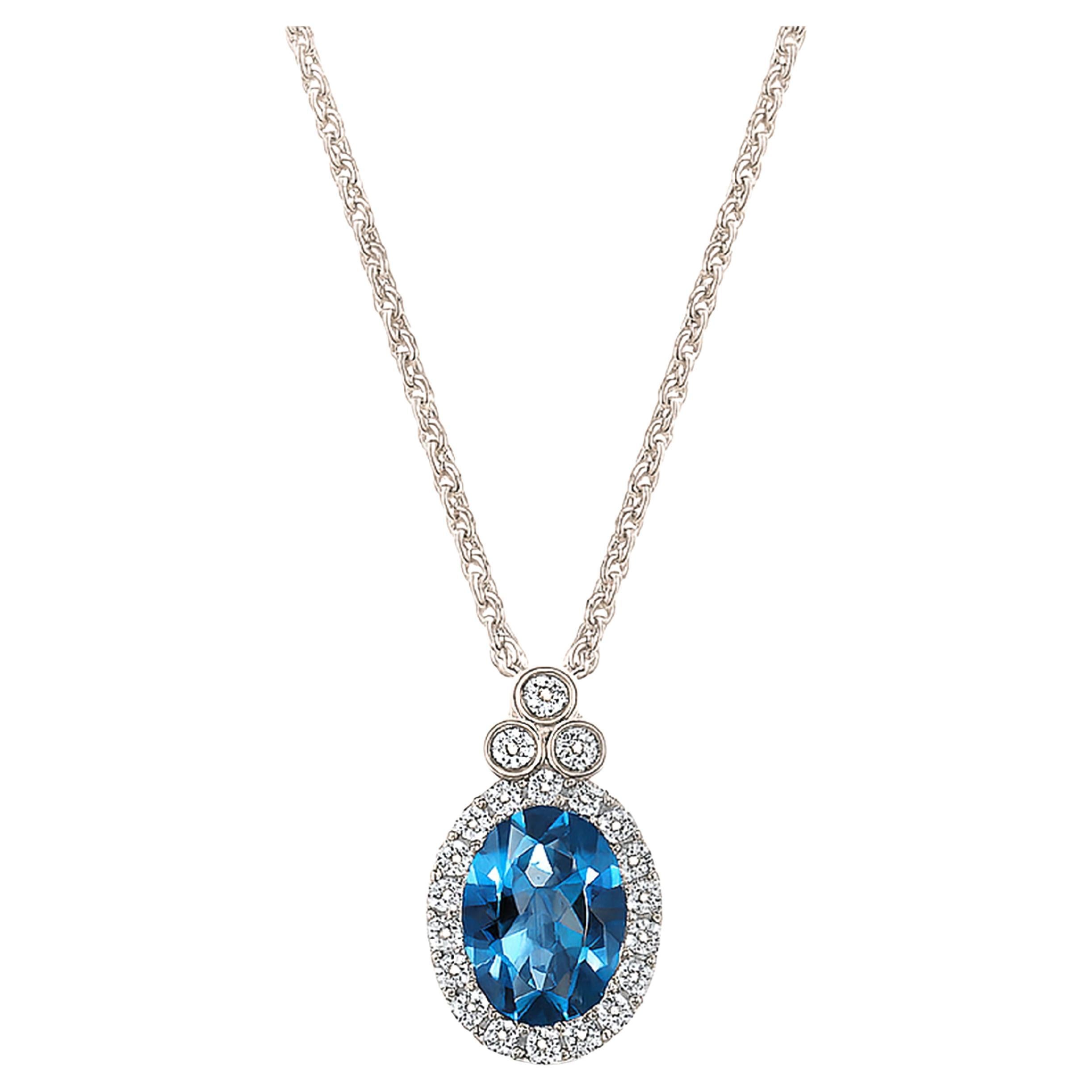 Collection S S en or blanc 18 carats Pendentif Topaze bleue ovale avec diamants en vente