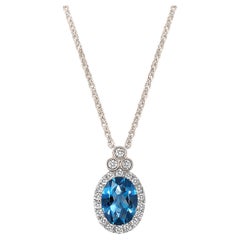 Collection S S en or blanc 18 carats Pendentif Topaze bleue ovale avec diamants